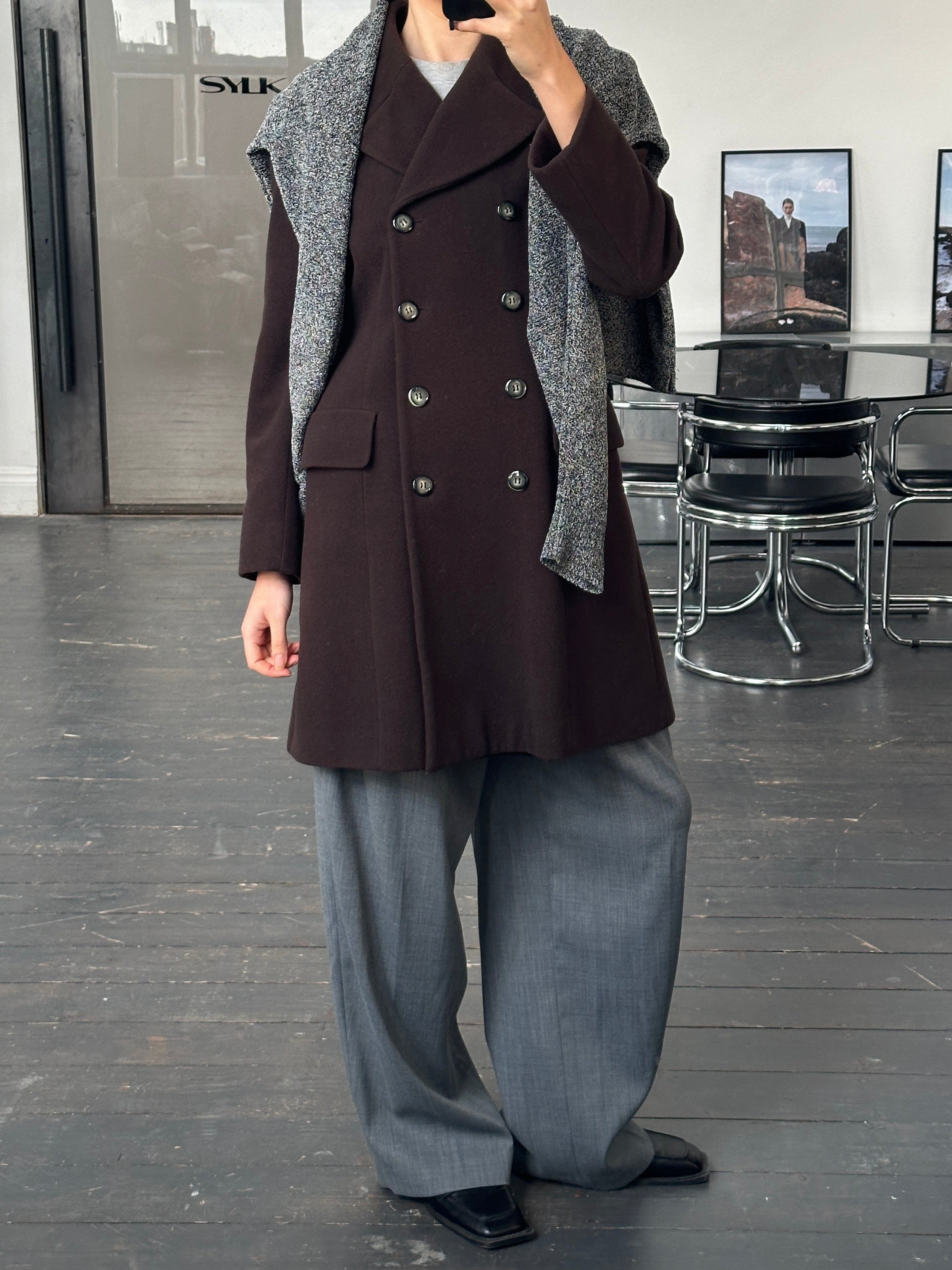 Vintage 1990s wool and cashmere double-breasted coat in size M, featuring classic design and textured fabric.