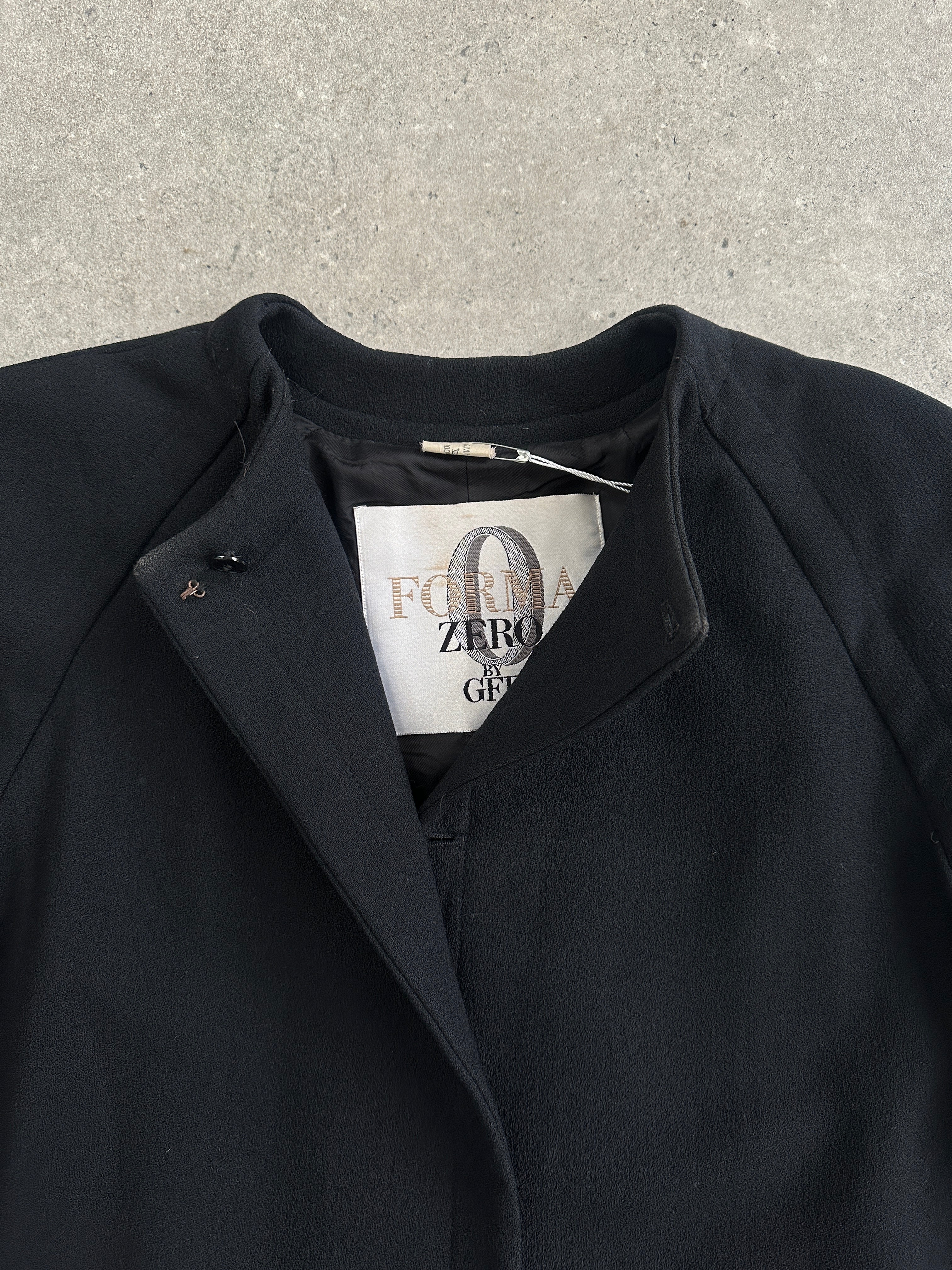 Gianfranco Ferre pure wool A-line coat in XL with minimal collarless design, shown in a neutral color.