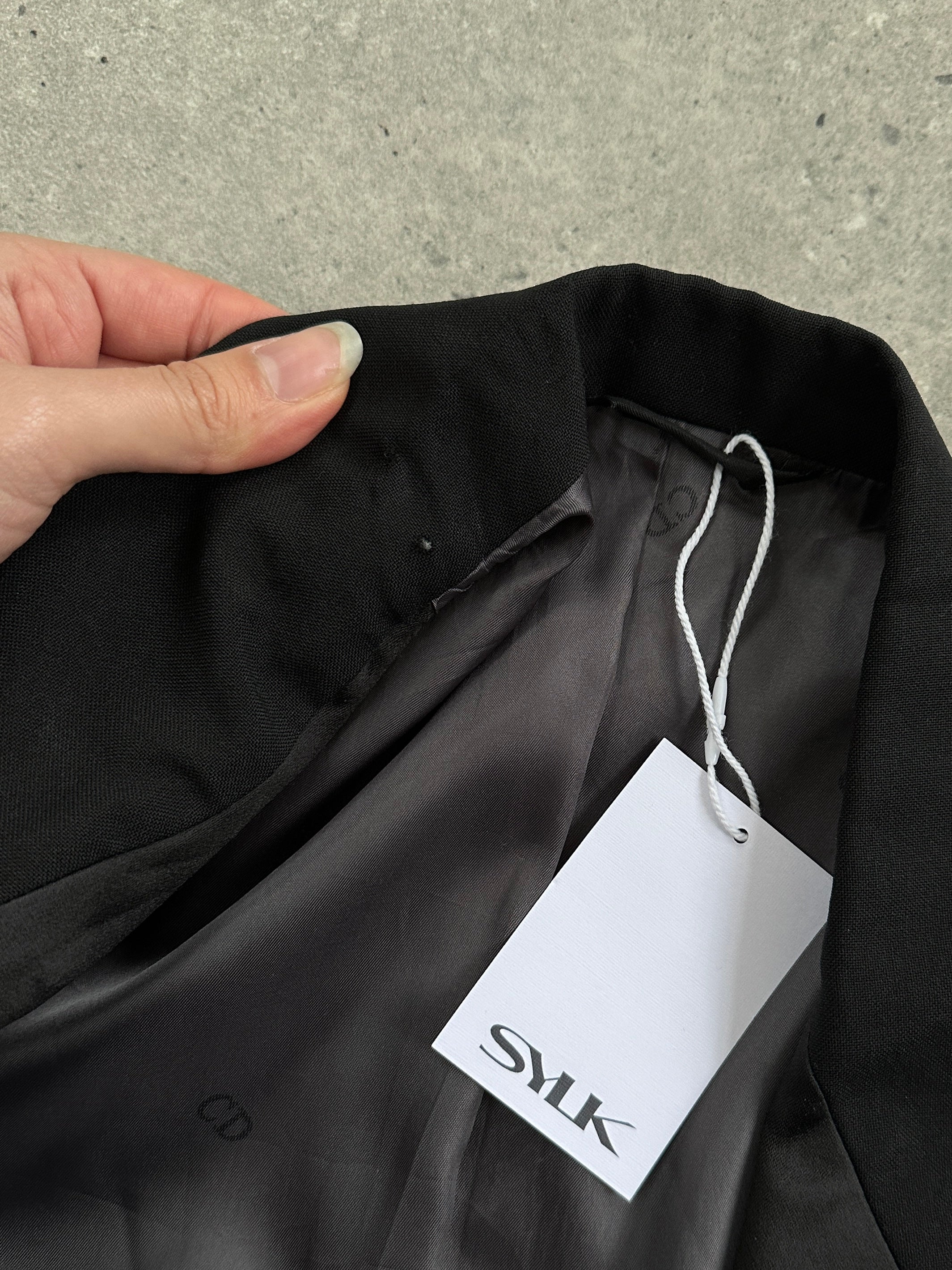 Christian Dior wool tuxedo blazer, single-breasted, in size 36R/XS, tailored fit with classic lapel and sleek design.