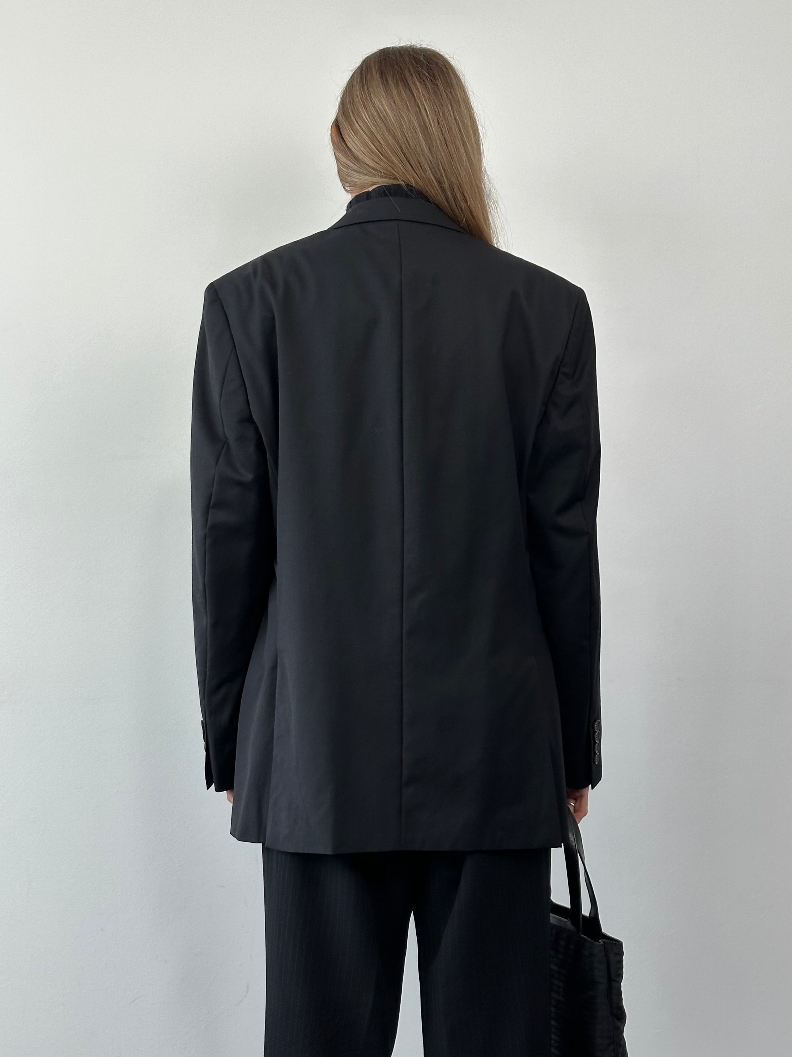 Ralph Lauren pure wool single-breasted blazer in size 42R/XL, shown in a sleek, tailored fit with classic lapel design.