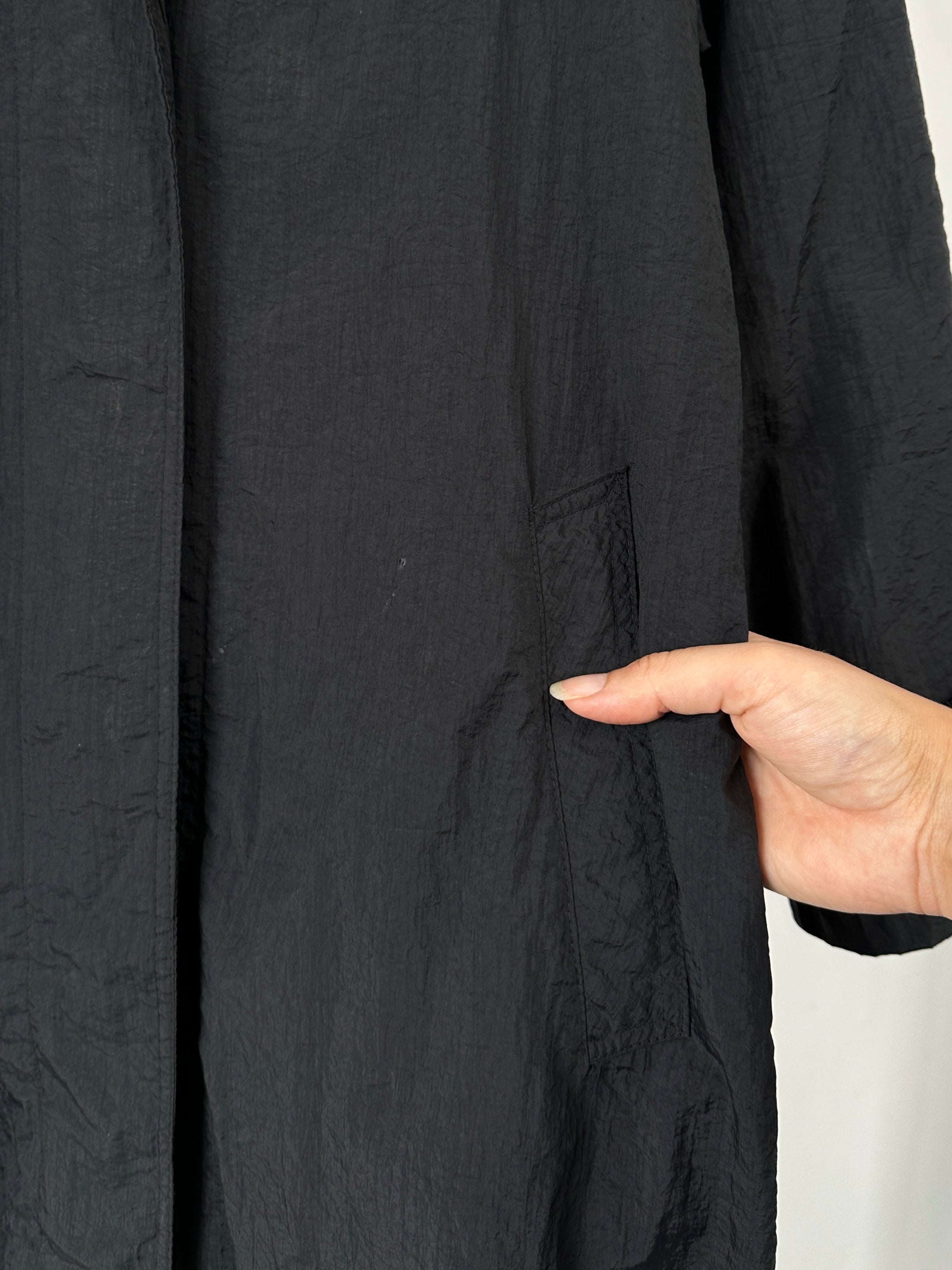 Vintage nylon trench coat with concealed placket, size small, featuring a classic design and smooth fabric.
