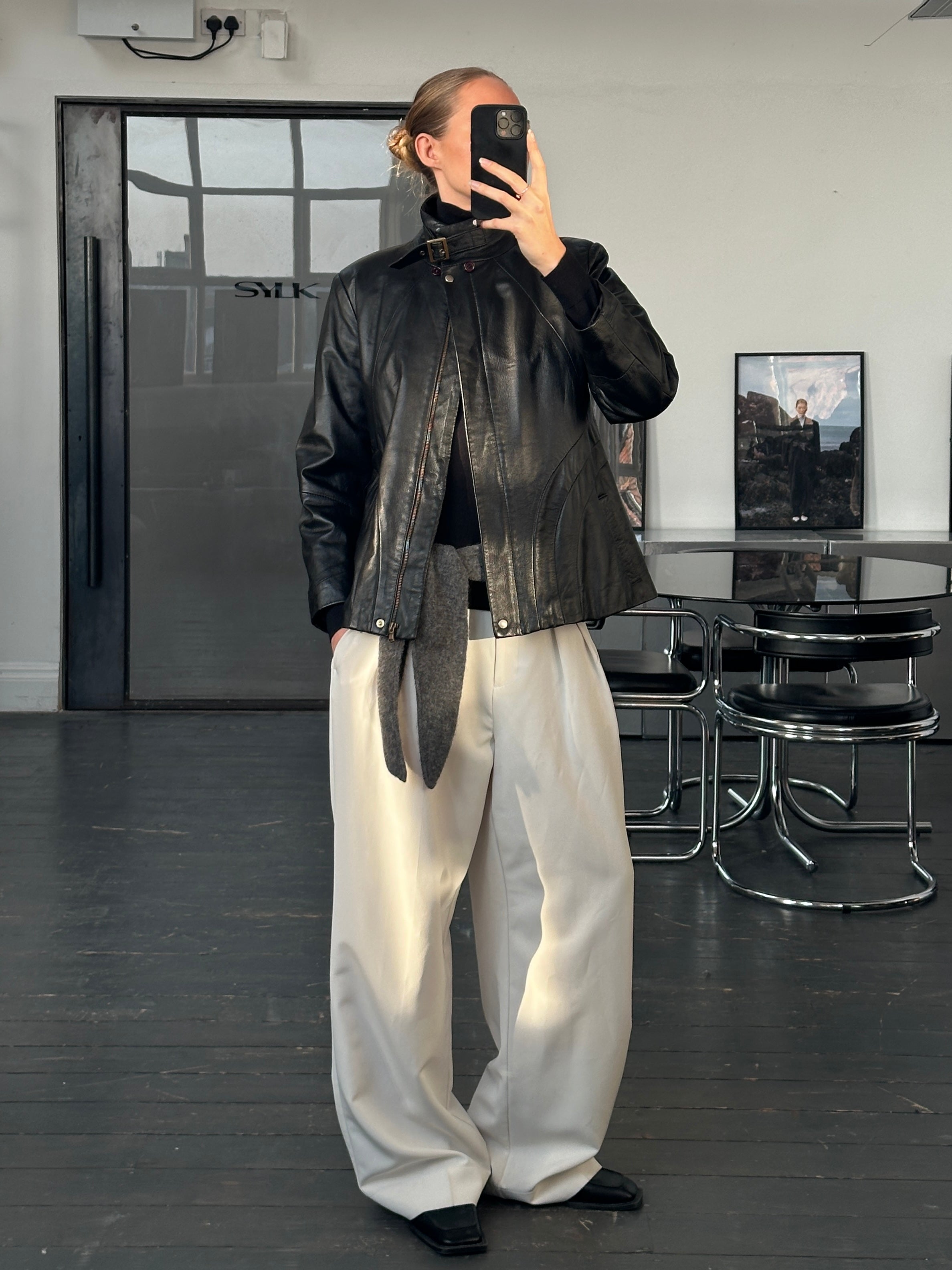 Vintage Italian 1990s high neck leather jacket, size M, classic leather outerwear with a vintage style and high neckline.