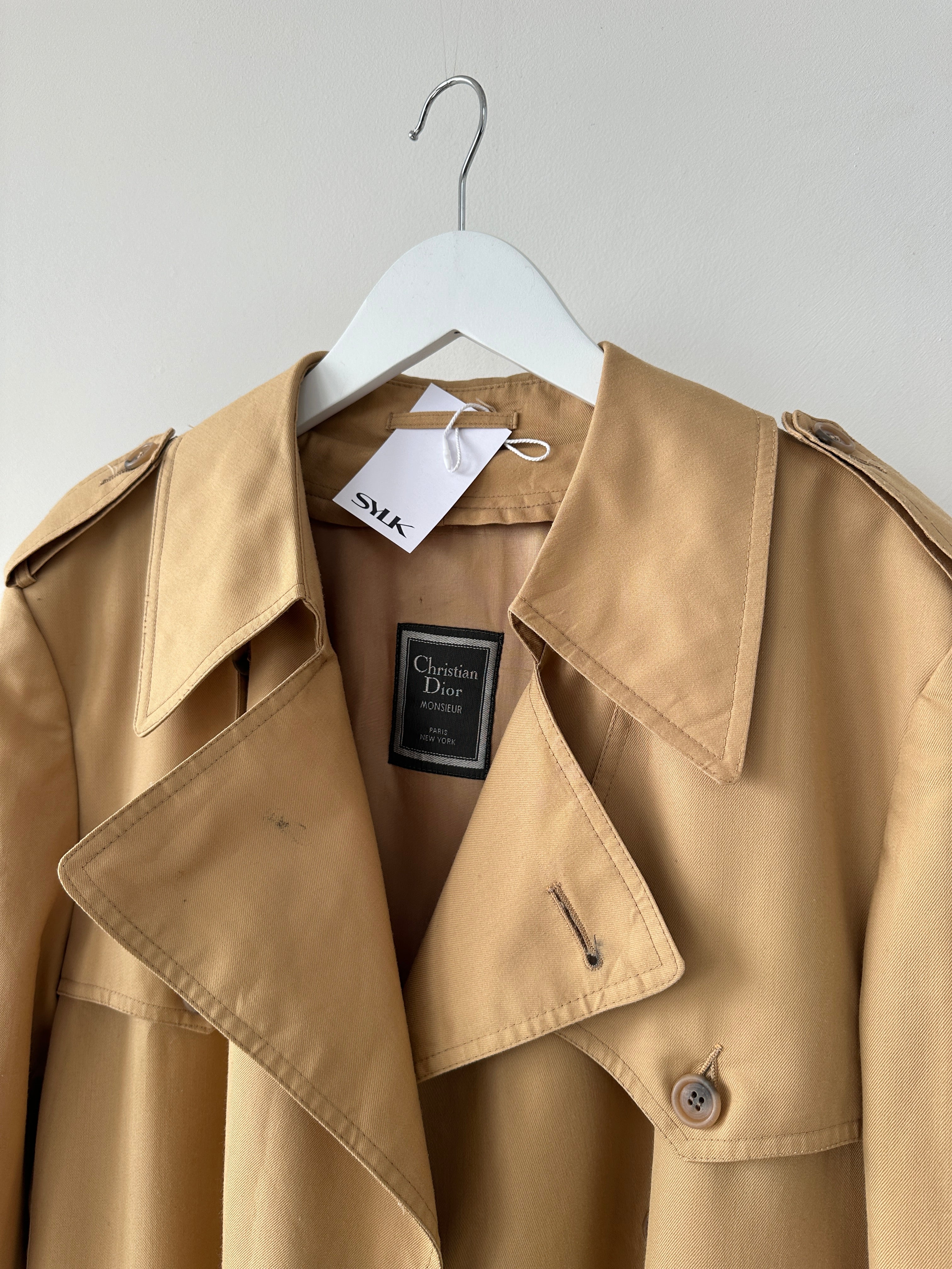 Christian Dior Monsieur double-breasted belted trench coat in XL, showcasing classic design and beige fabric with tailored fit.