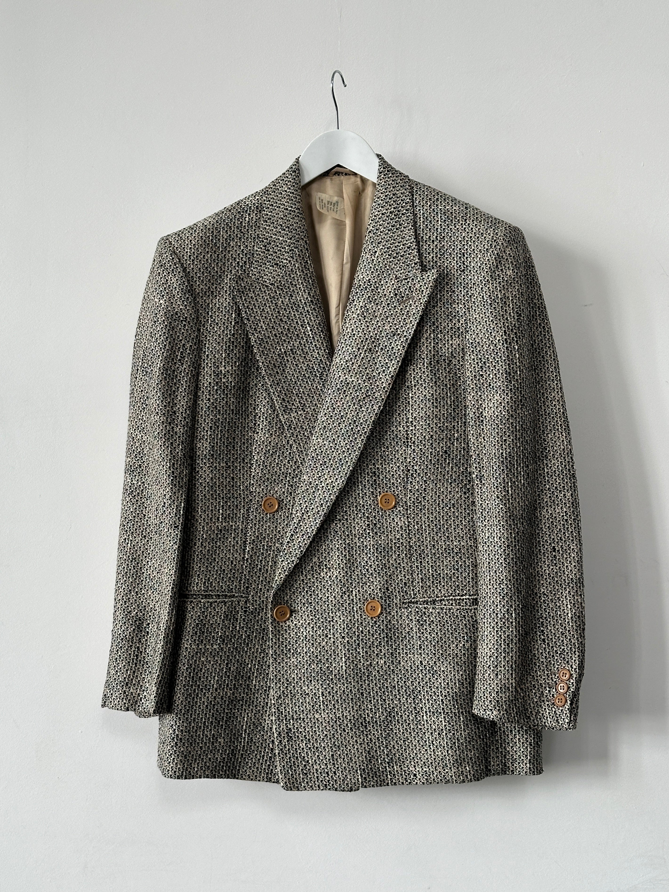 Giorgio Armani Black Label double-breasted blazer in black, tailored fit with lapels, front buttons, and structured design.