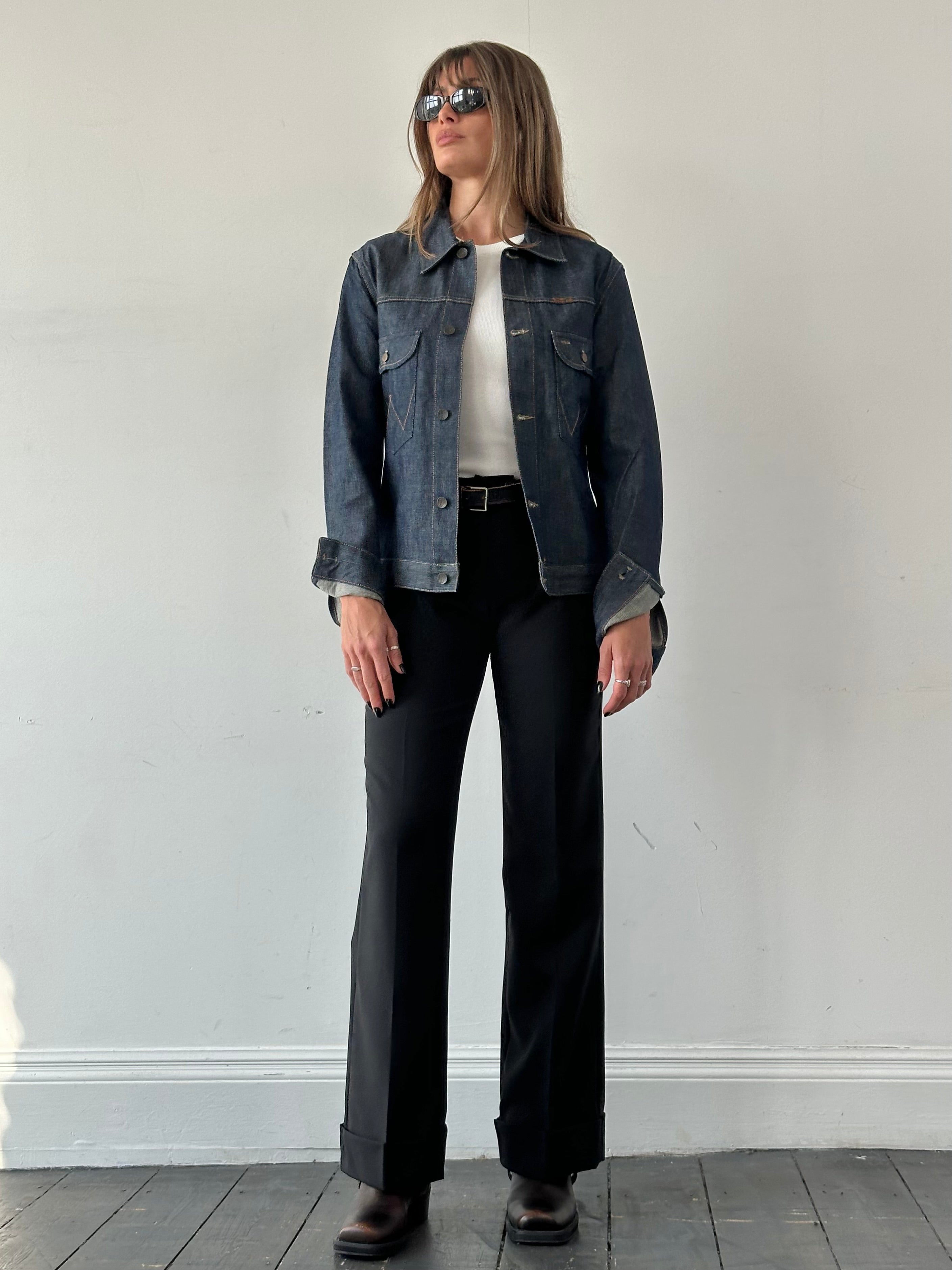 Wrangler organic cotton denim jacket in size S/M, front view showing classic blue wash and button closure.