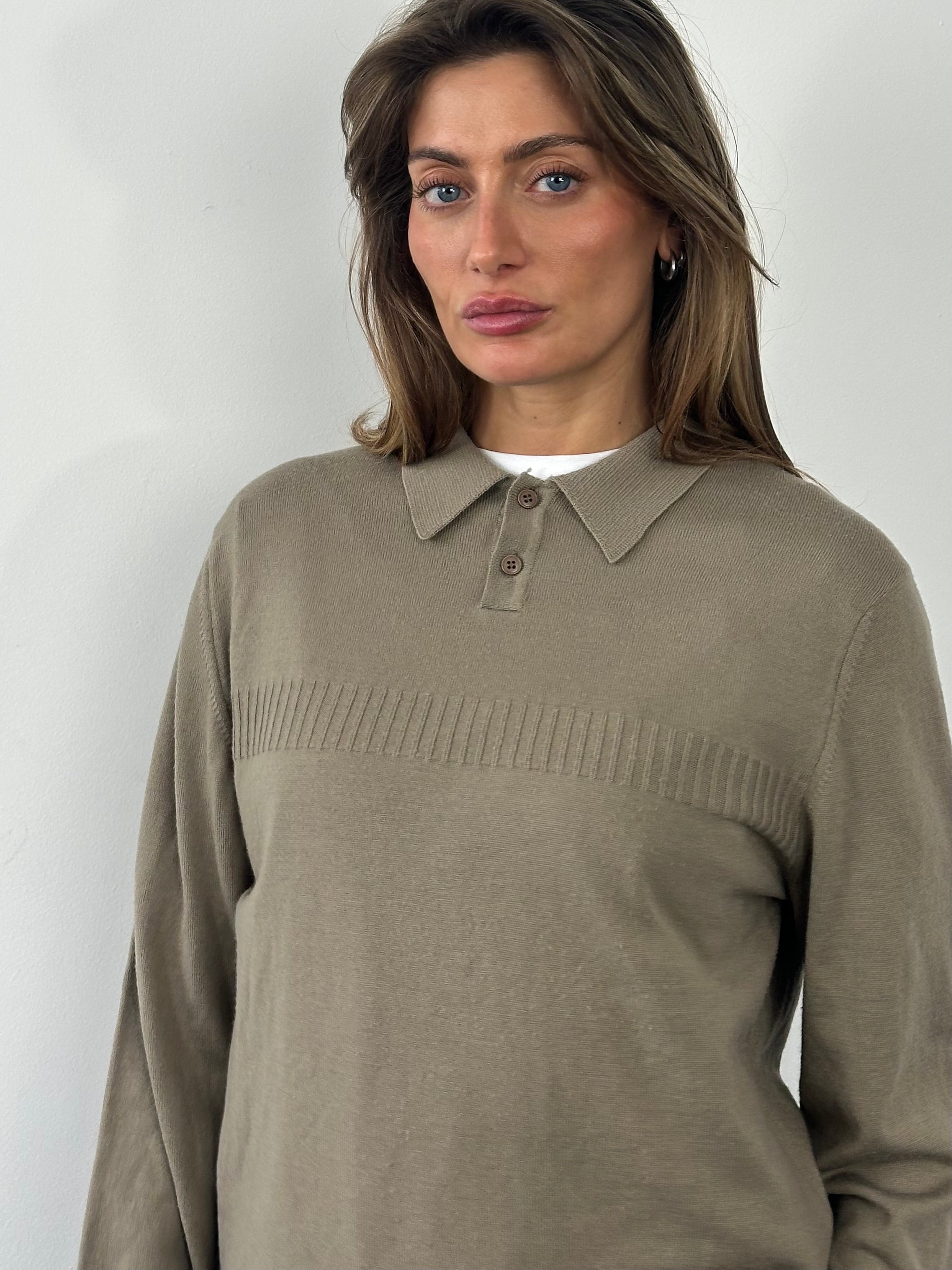 Yves Saint Laurent 1990s wool knit logo jumper in black, featuring the iconic YSL logo on the front, size M.