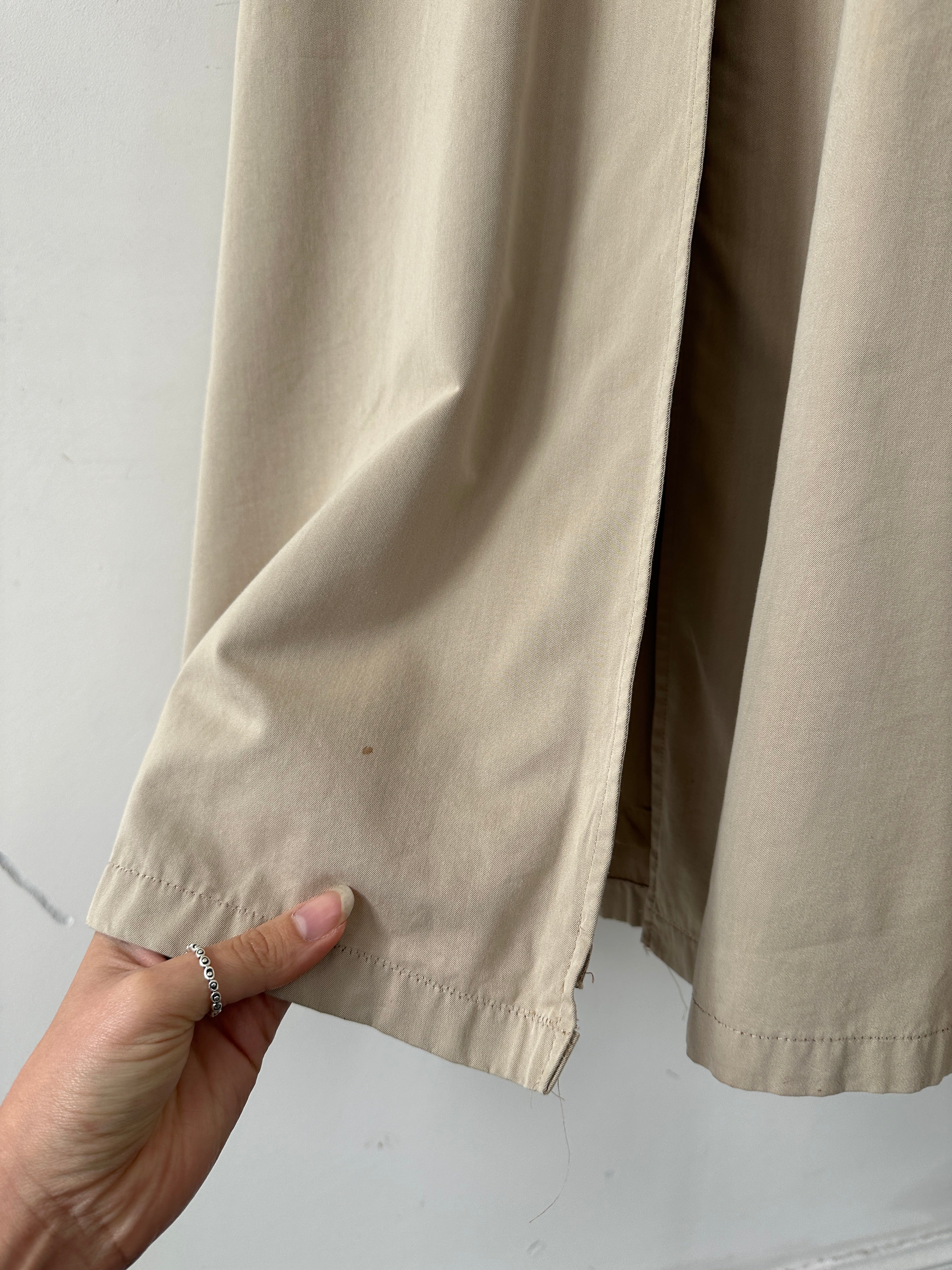 Mani Cotton Cupro belted trench coat in size L/XL, shown with classic collar, belt at waist, and long sleeves.