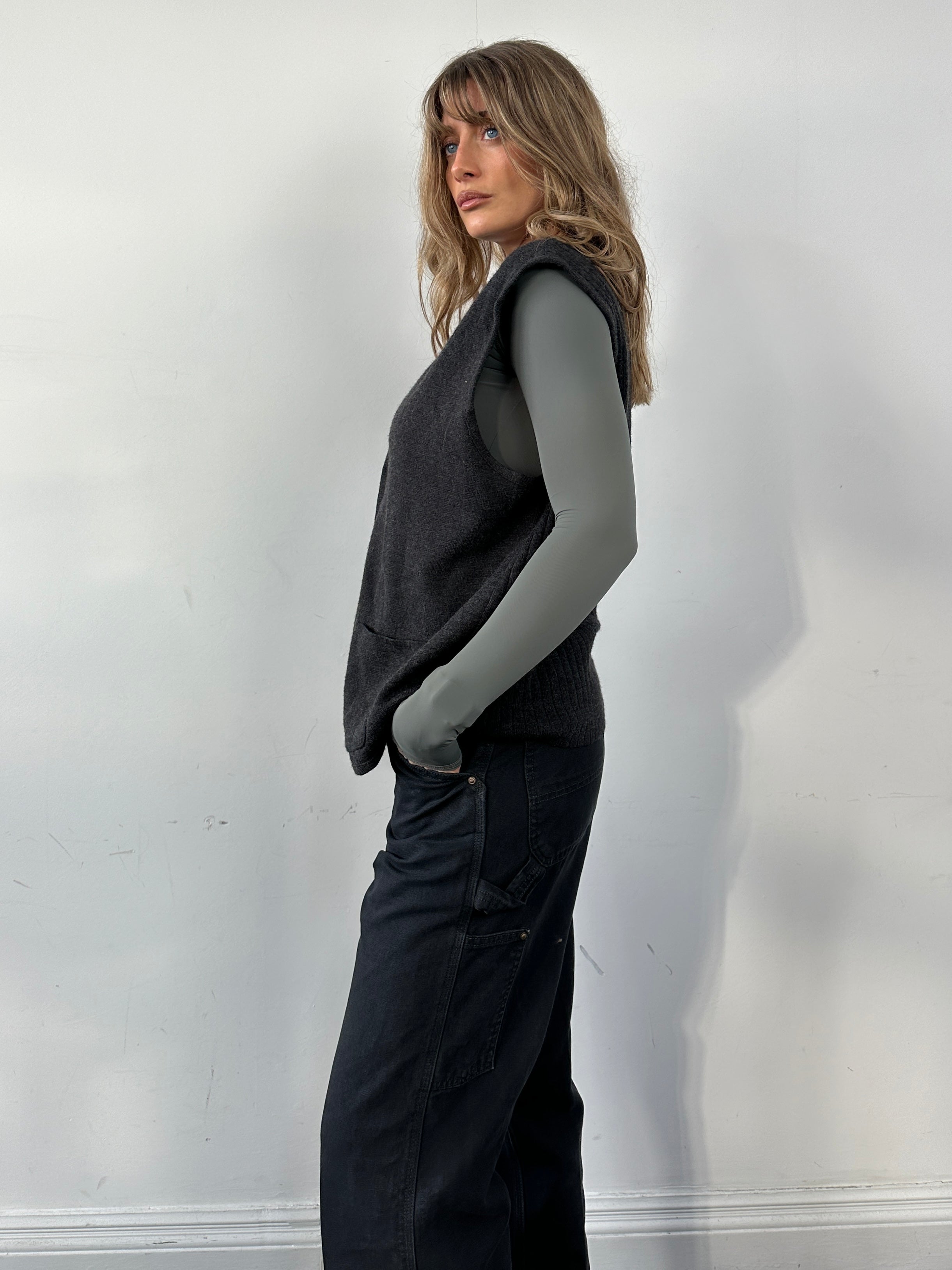 Vintage Wool Knit Waistcoat in XL, a cozy vintage coat with textured knit fabric and classic design, visible in the image.