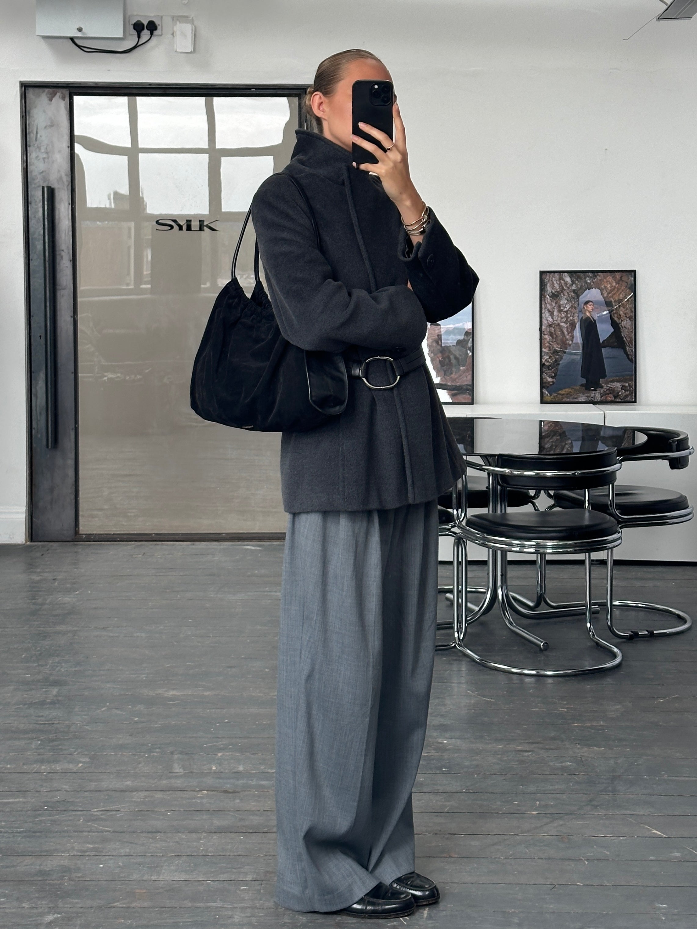 Gucci 1990s Tom Ford suede leather hobo shoulder bag with slouchy design and casual style, featuring a soft, textured surface.