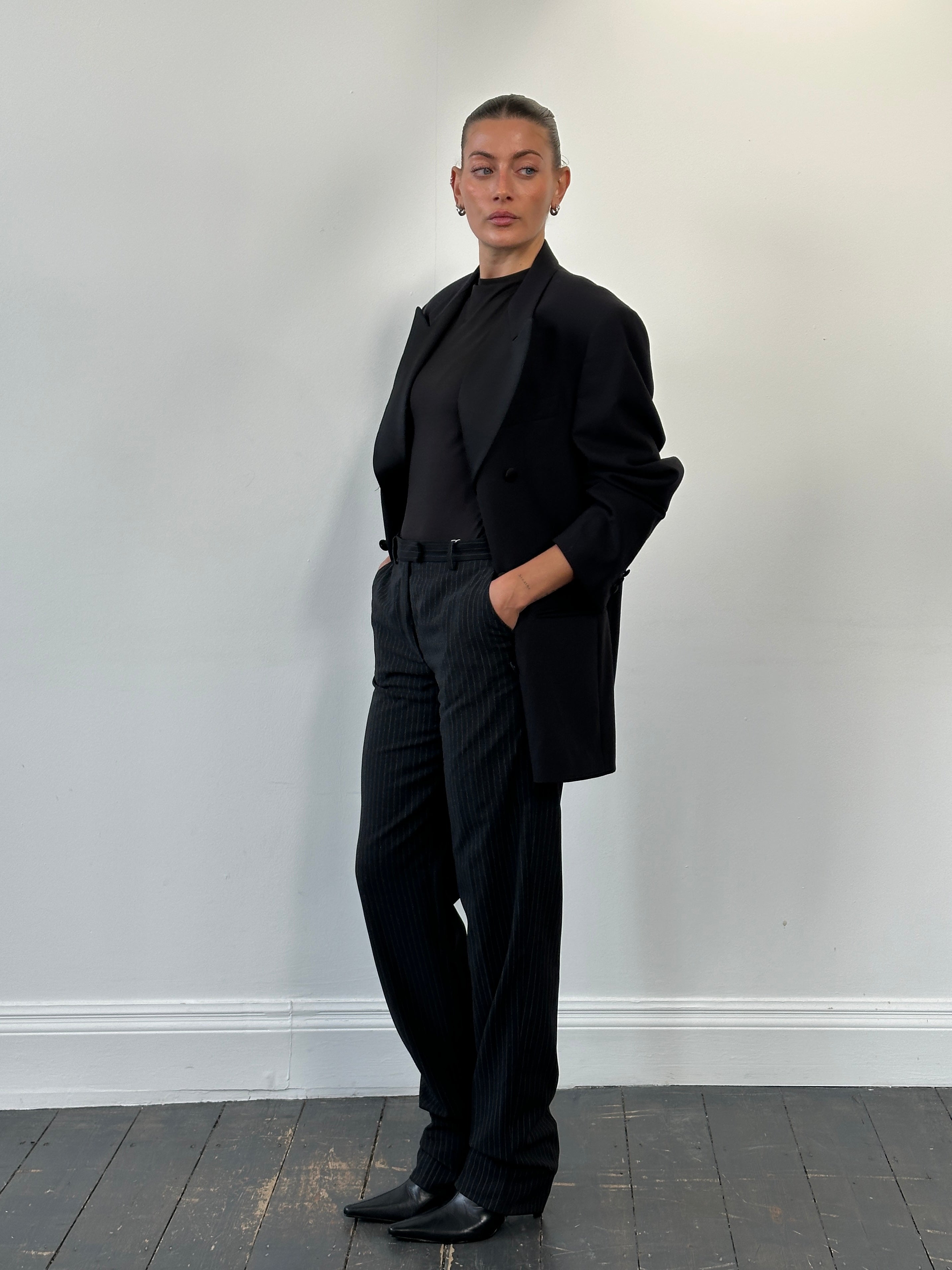 Armani Collezioni 2000s pure wool tailored trousers with straight leg fit, size W28, in classic dark color.