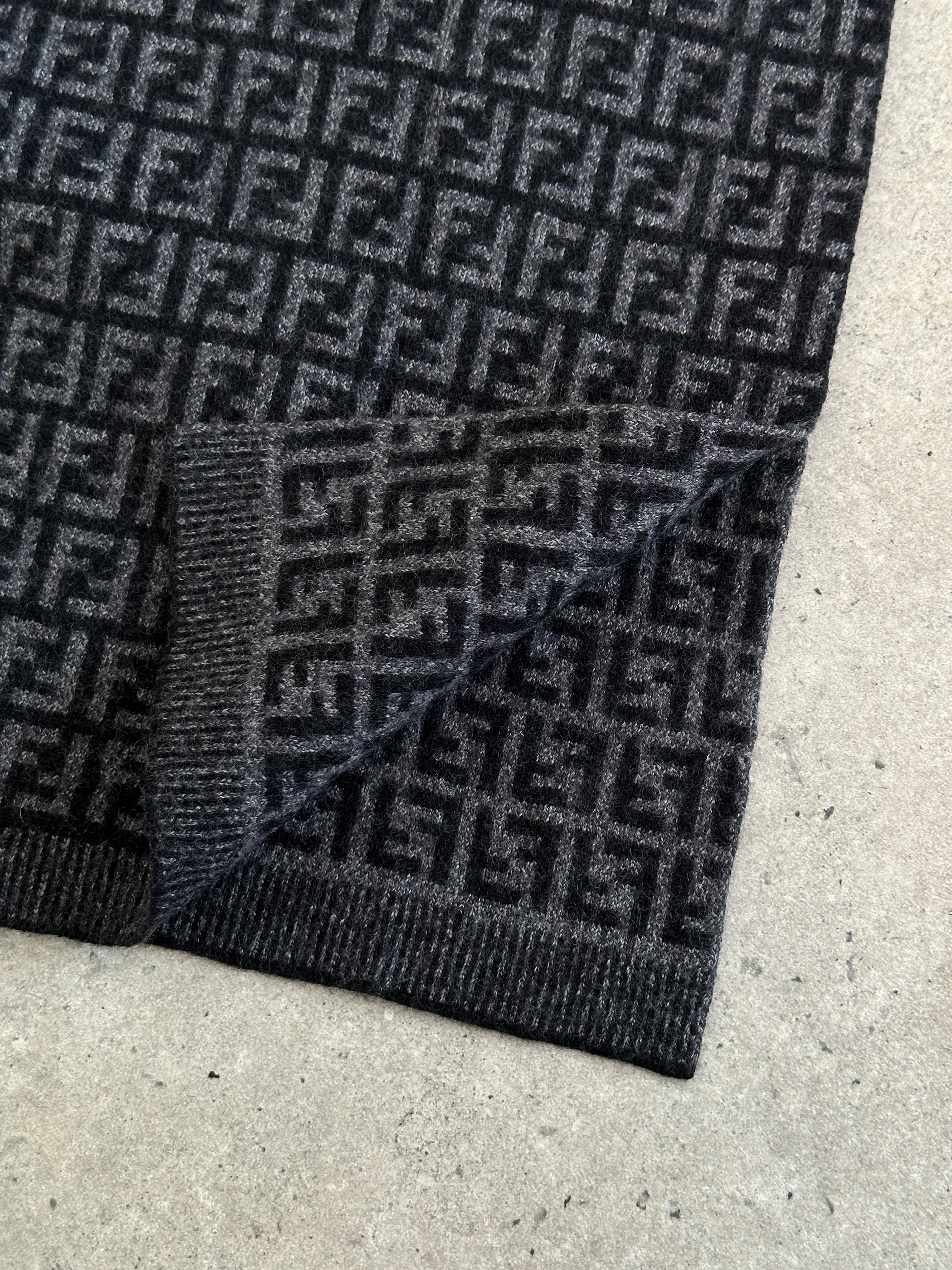 Fendi FF Monogram pure wool scarf featuring the iconic logo pattern in beige and brown tones.