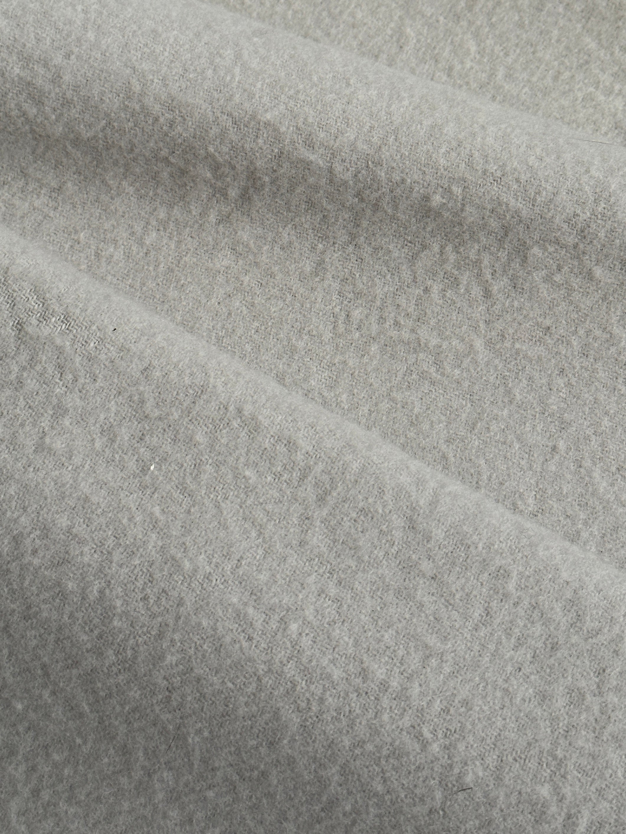 Giorgio Armani Le Collezioni 2000s pure wool logo scarf with elegant design, displayed flat showcasing its luxurious texture and branding.