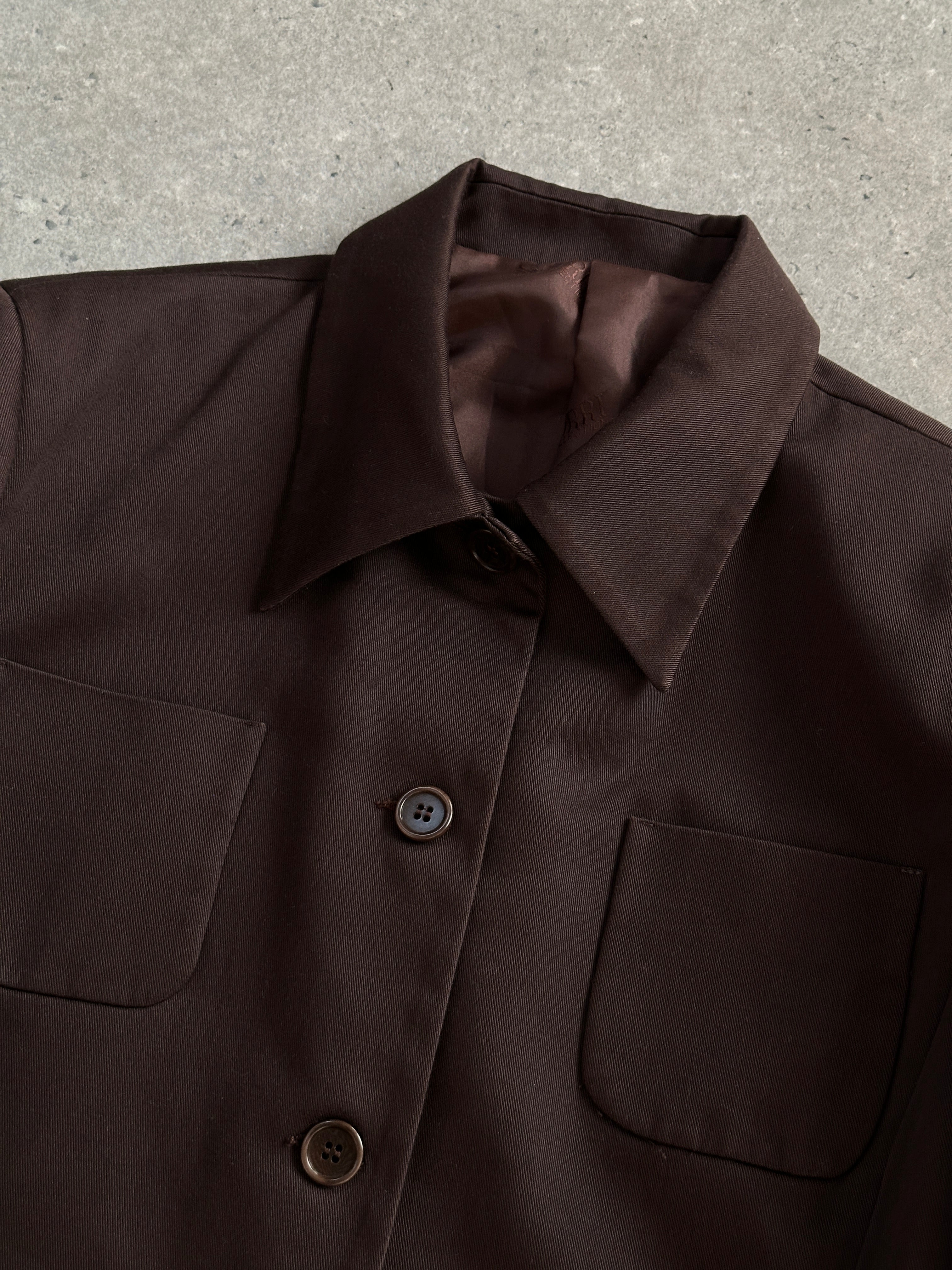 Italian Vintage 2000s pure cotton tailored jacket, size M, featuring classic design and structured fit, seen from the front.