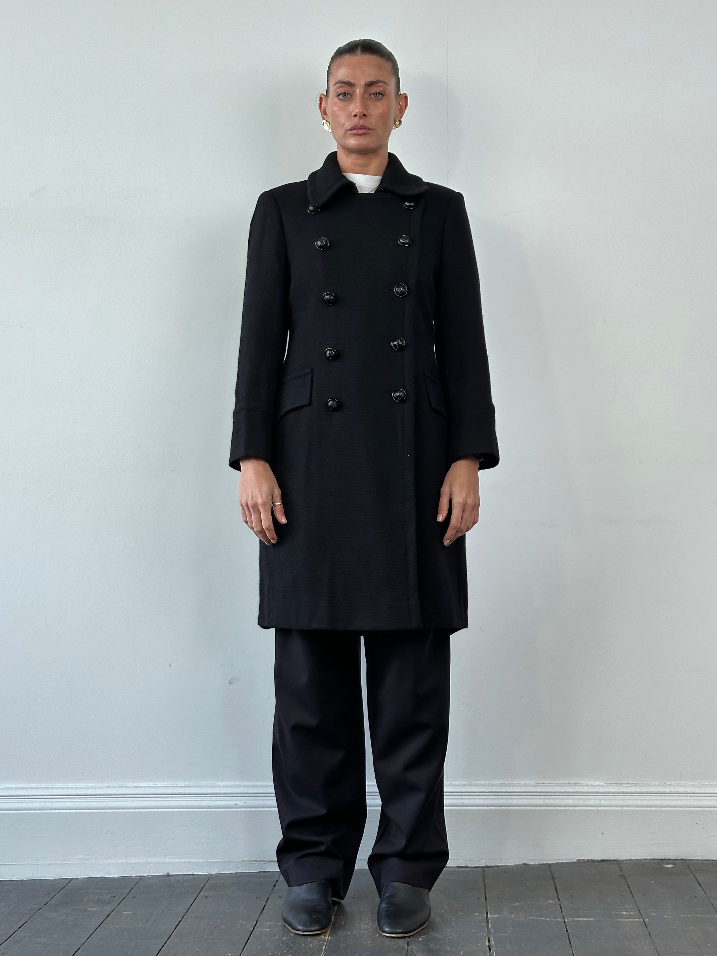 Moschino Cheap & Chic double-breasted coat in size M, featuring classic design and tailored fit, shown on a hanger against a neutral background.