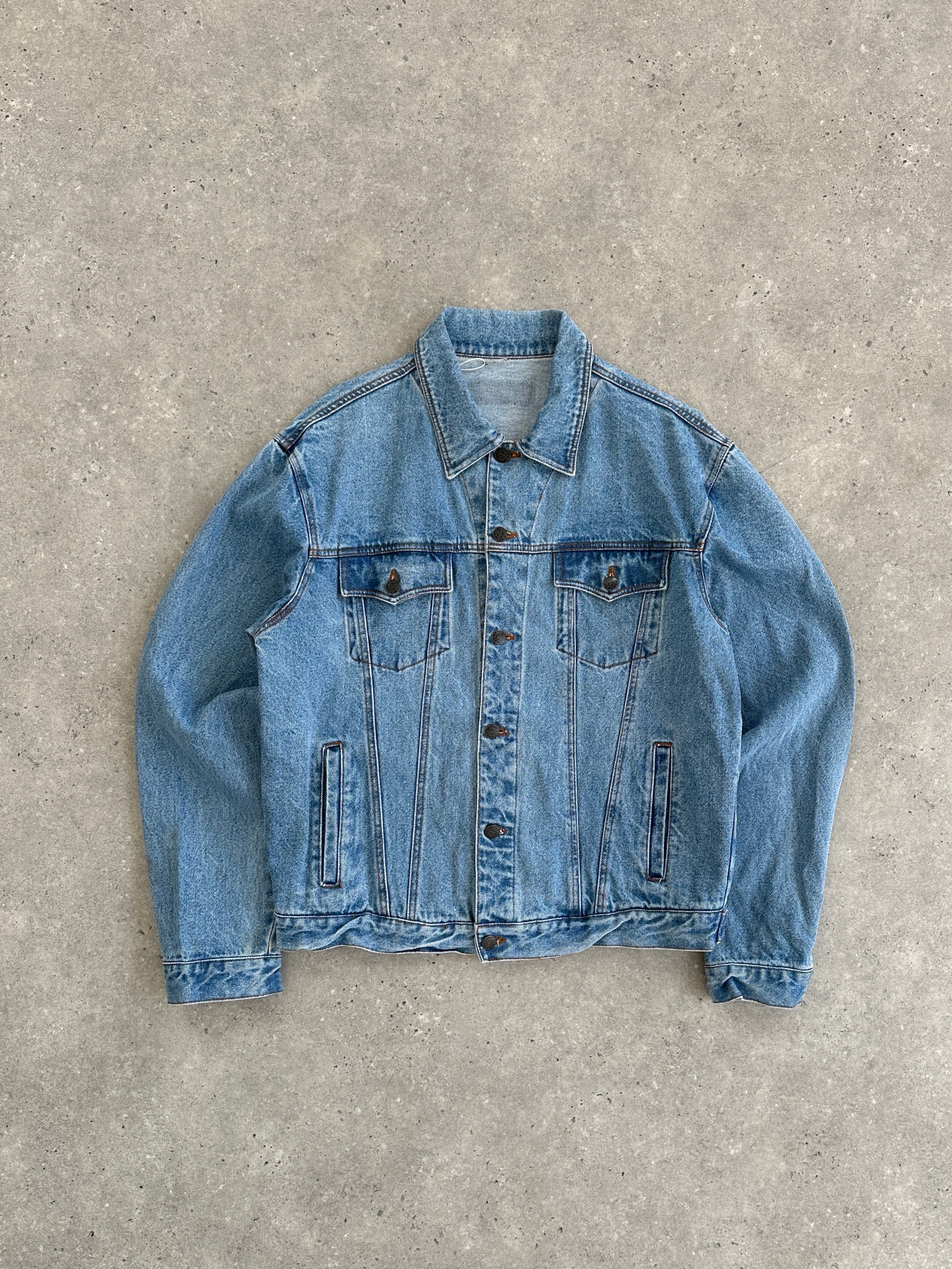Vintage oversized pure cotton denim jacket, casual style, shown on a hanger with button details and classic denim wash.