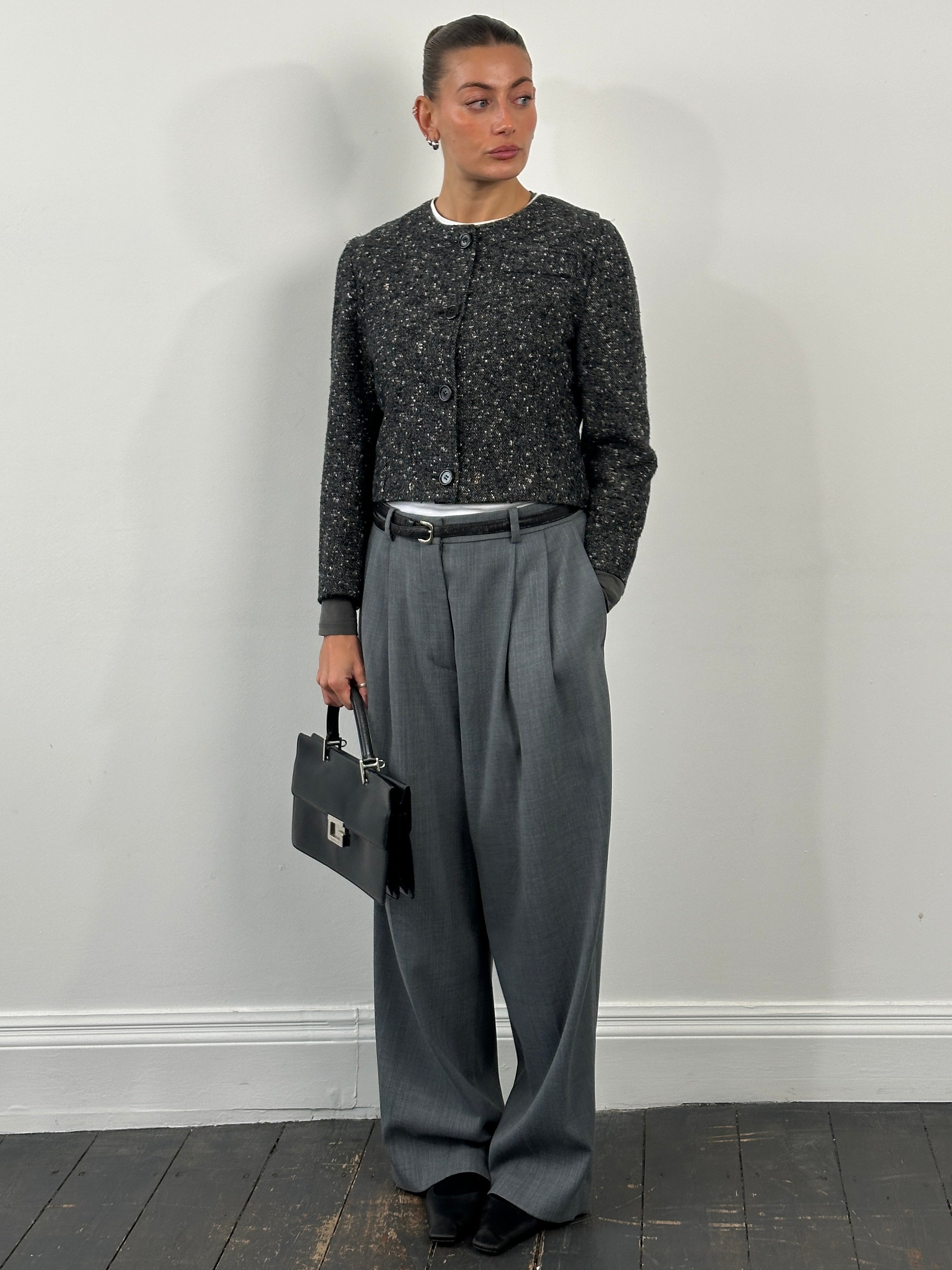 Italian vintage 1990s pure wool tailored jacket in size S/M, featuring classic craftsmanship and timeless style.