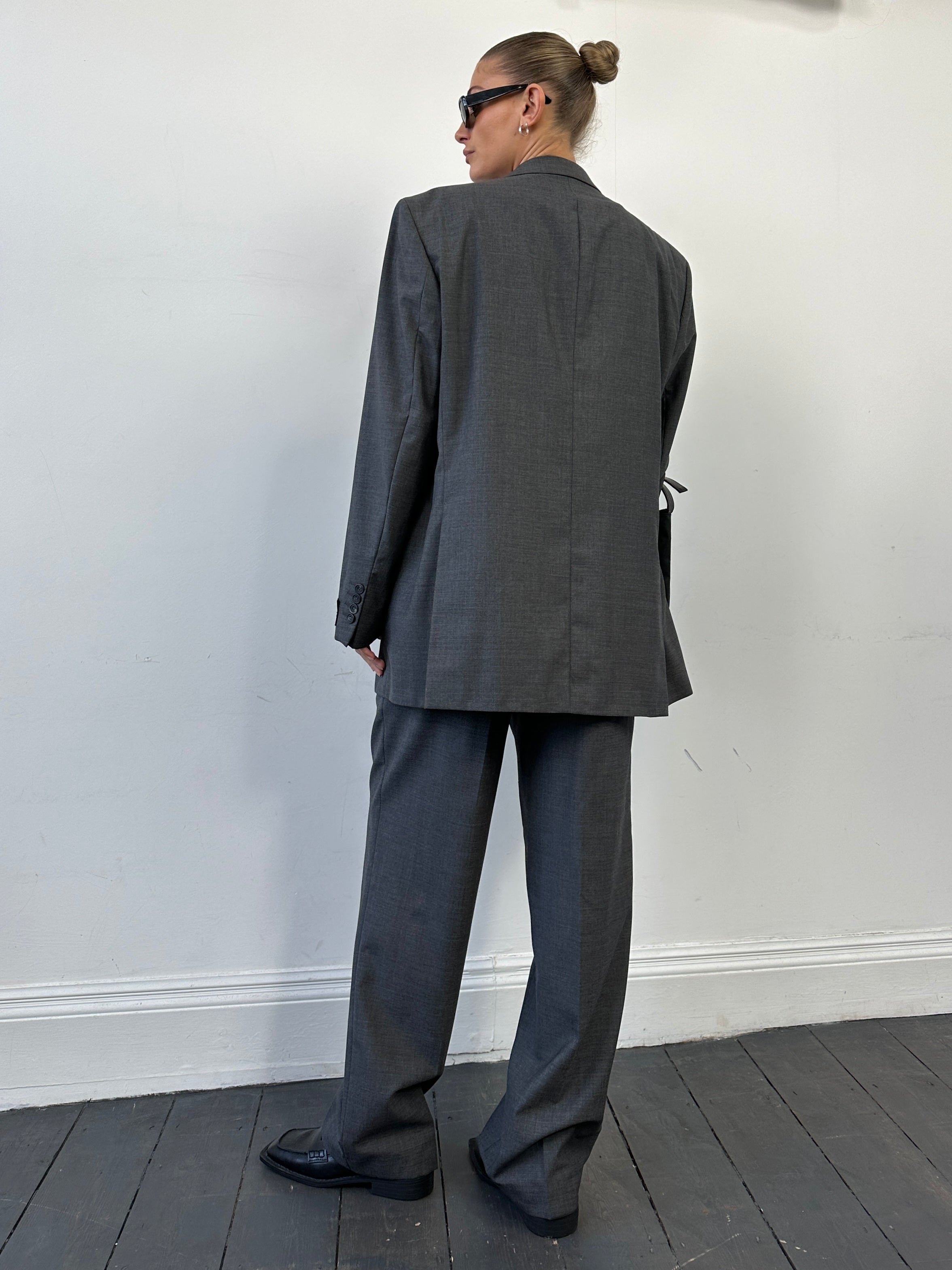 Vintage pure wool single-breasted jumpsuit in size 44R/W36, featuring classic tailored design and vintage style.