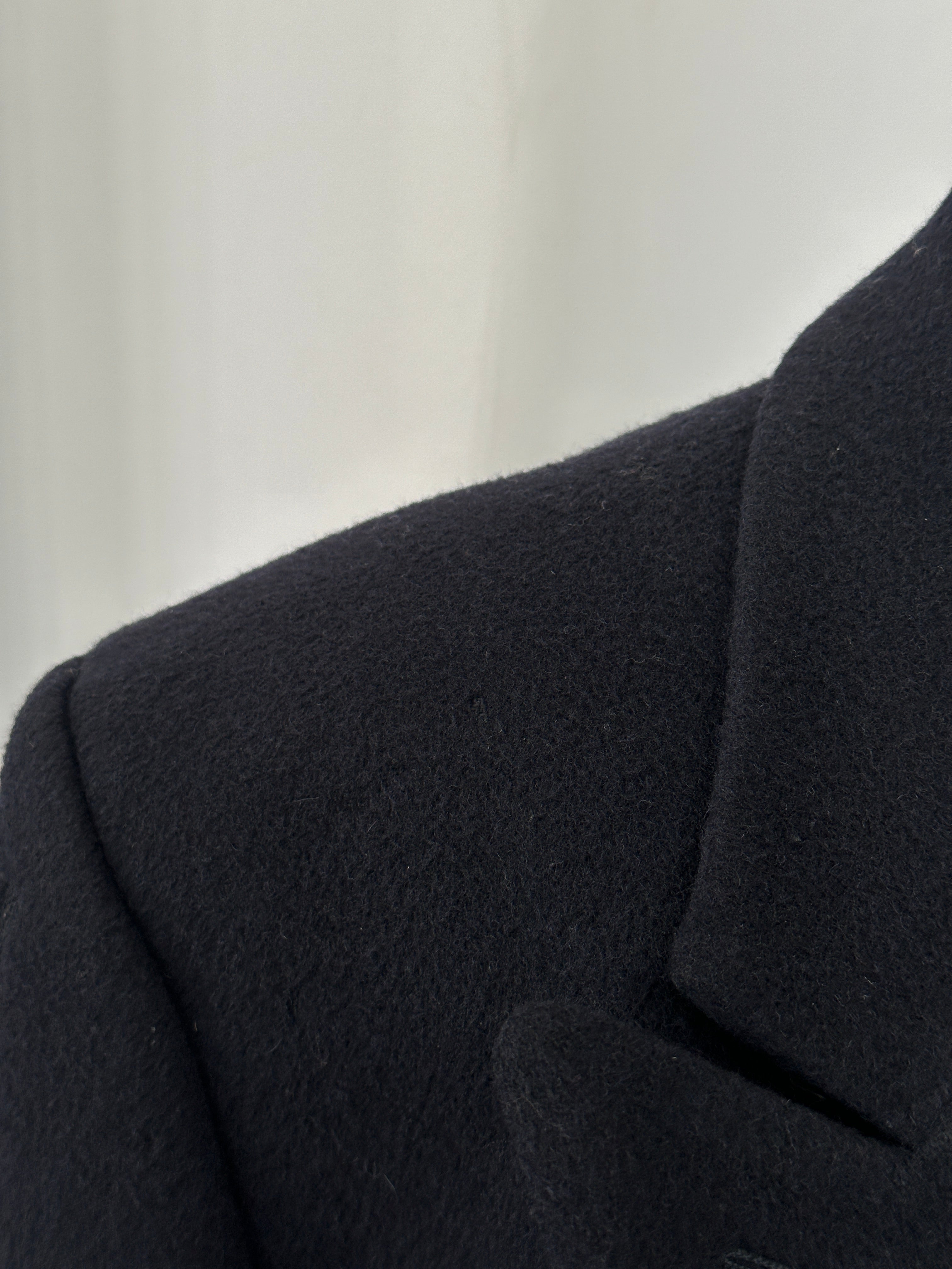 Vintage British 1990s wool and cashmere double-breasted coat in XL, classic 1990s style with a tailored fit and textured fabric.