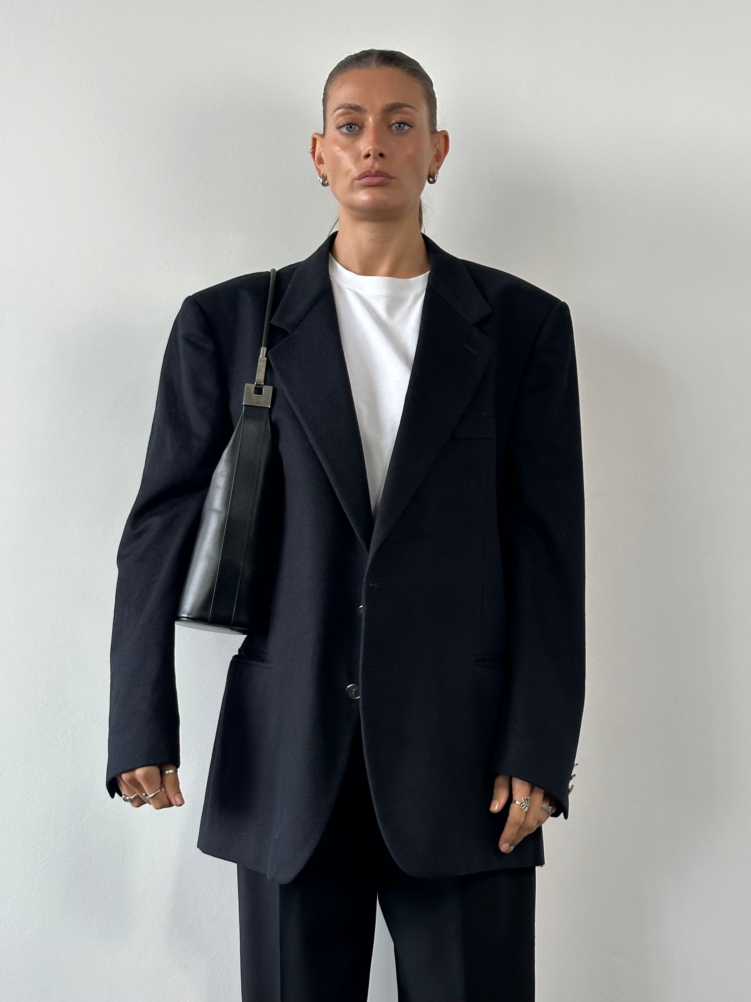 Yves Saint Laurent men's brushed wool cashmere blazer in size XL, tailored fit with bespoke button details.