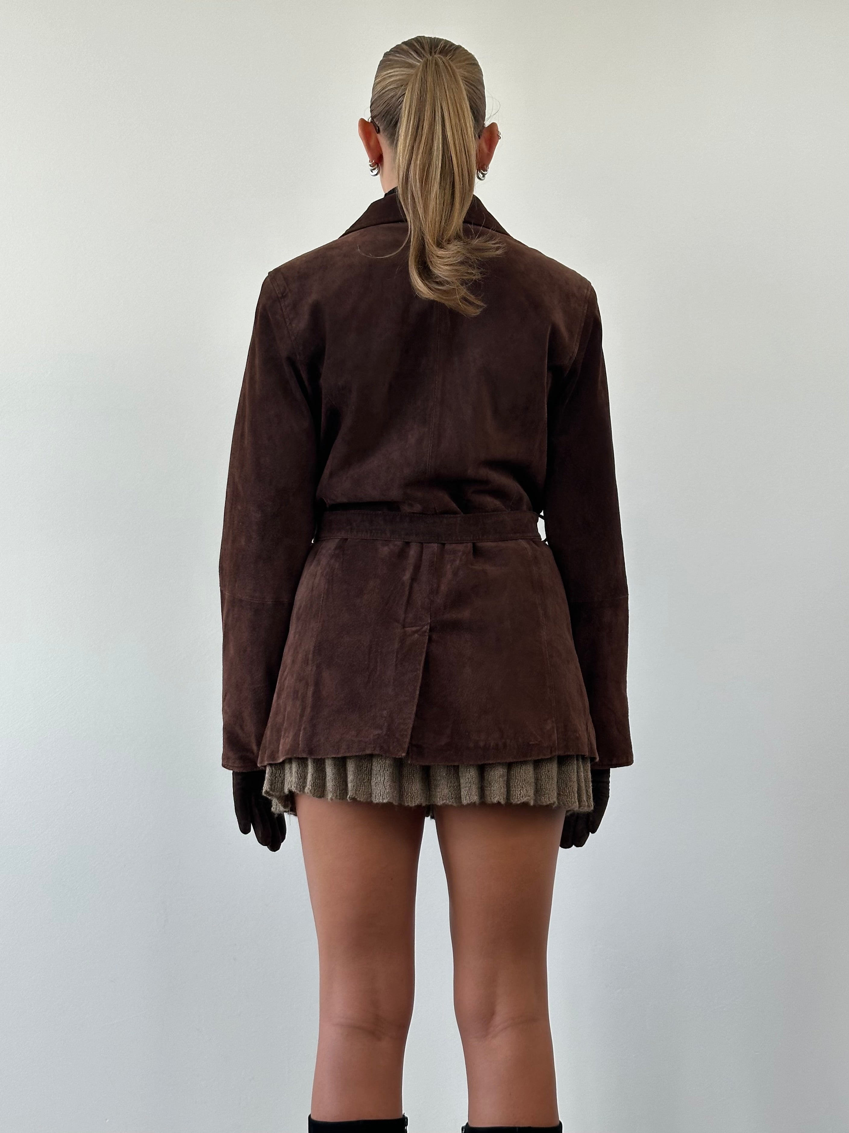 Vintage double-breasted belted suede jacket in M/L size, featuring classic design and soft brown suede material.