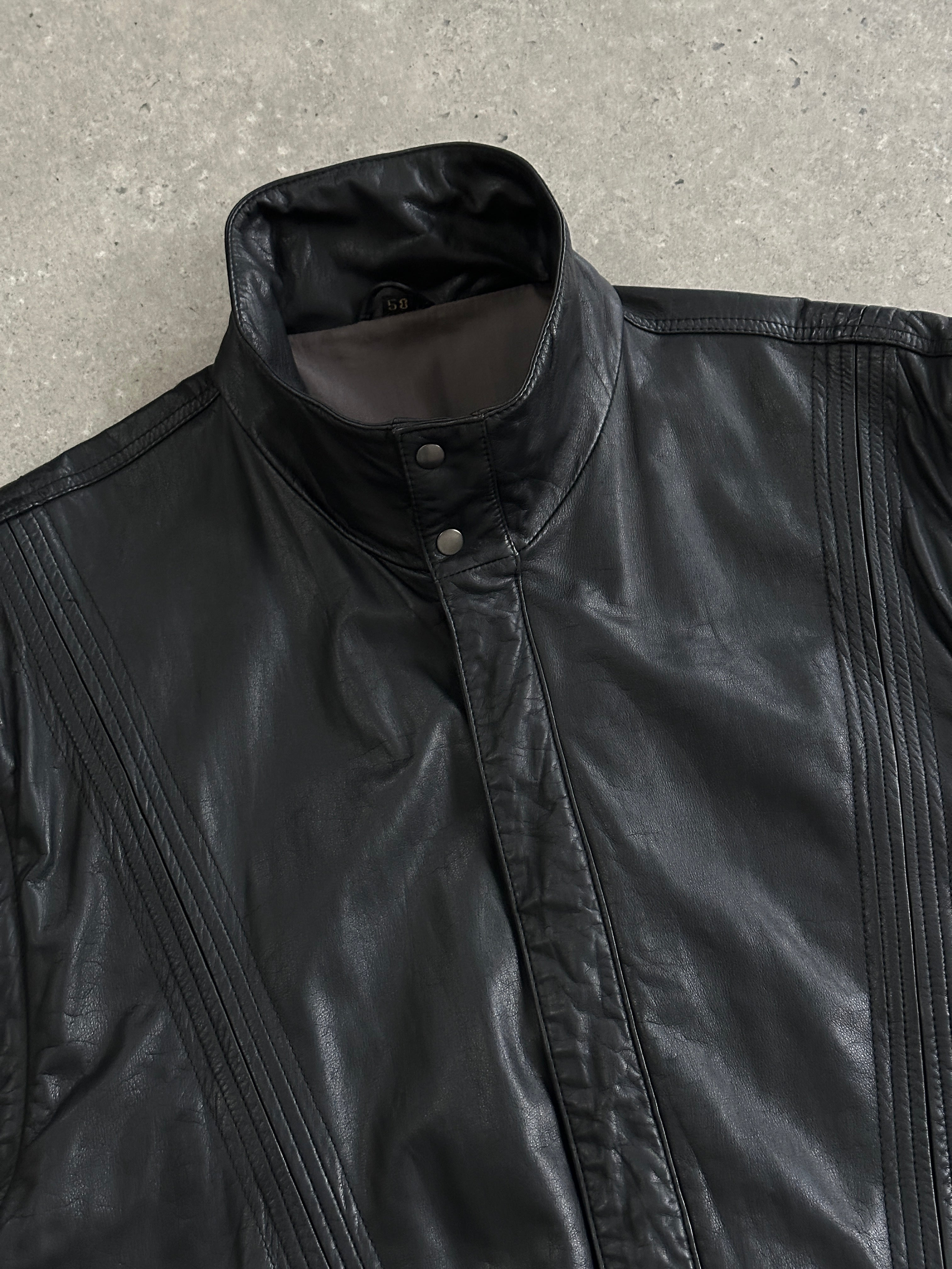 Vintage leather bomber gilet jacket in XL, featuring classic design with a soft leather texture and ribbed collar and hem.