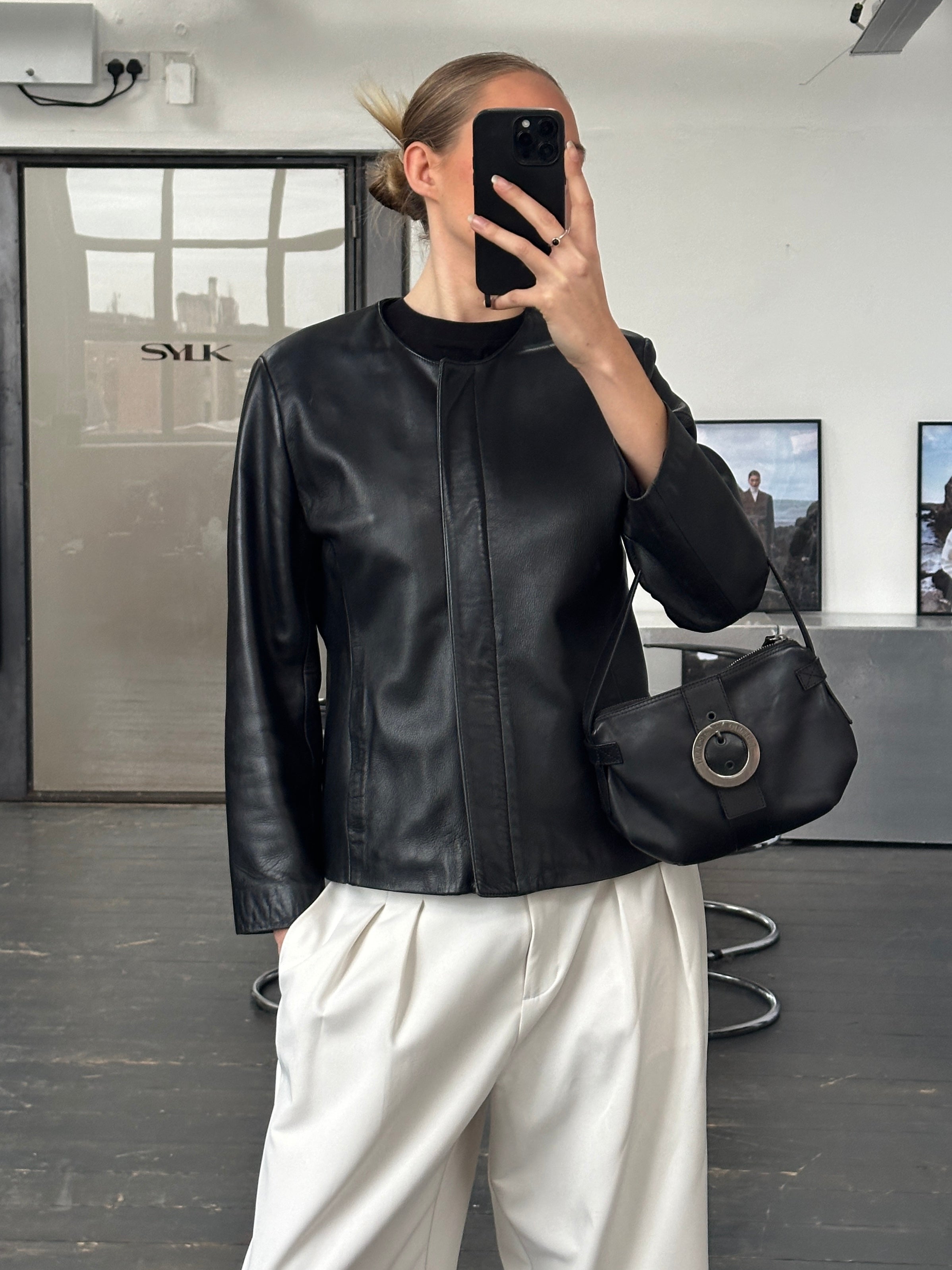 Vintage 1990s round neck leather jacket in minimal style, size M, made of soft leather with a classic fit.