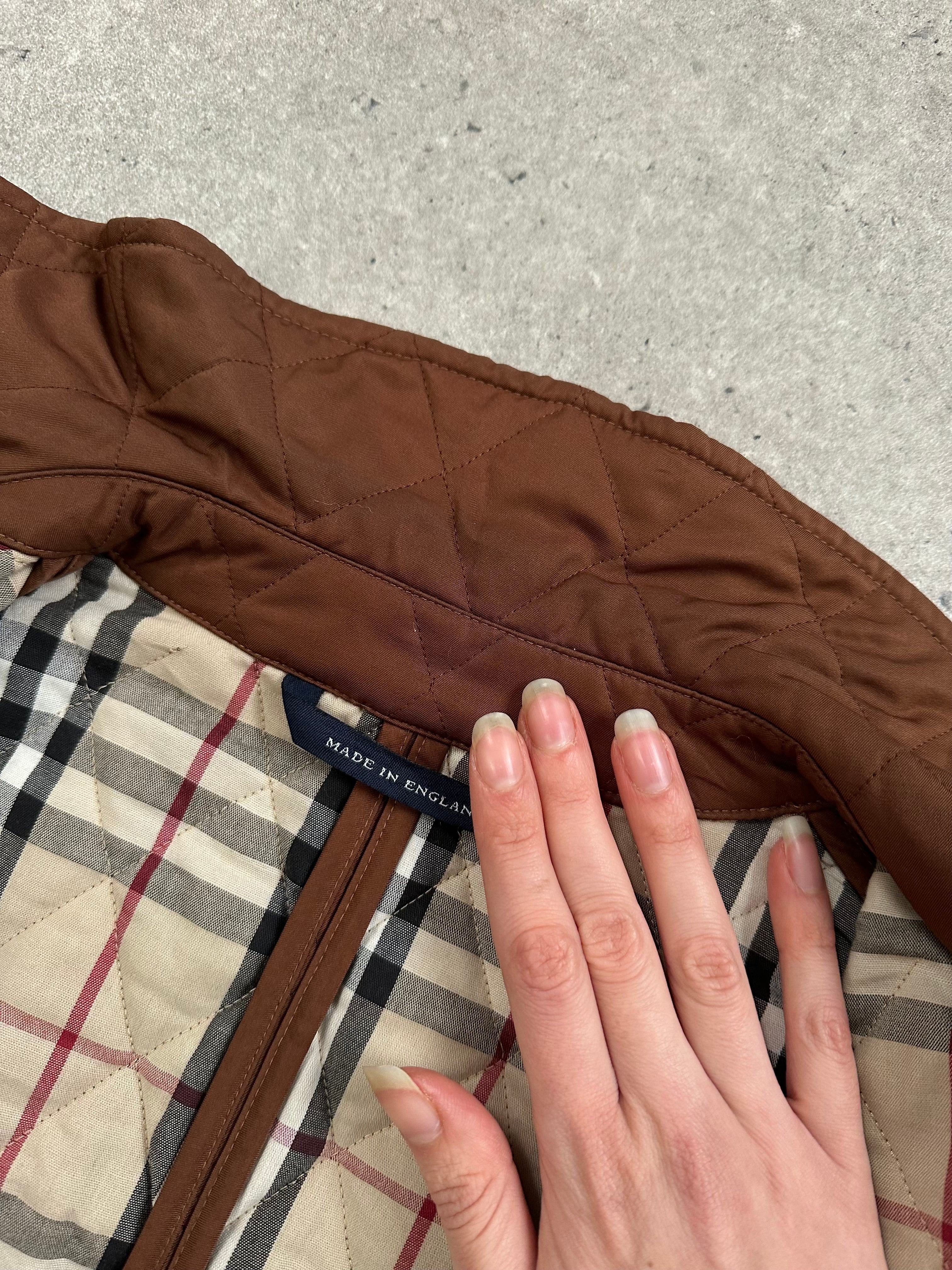 Burberry 2000s quilted Nova Check jacket in size M, featuring classic check pattern, quilted design, and stylish coat silhouette.