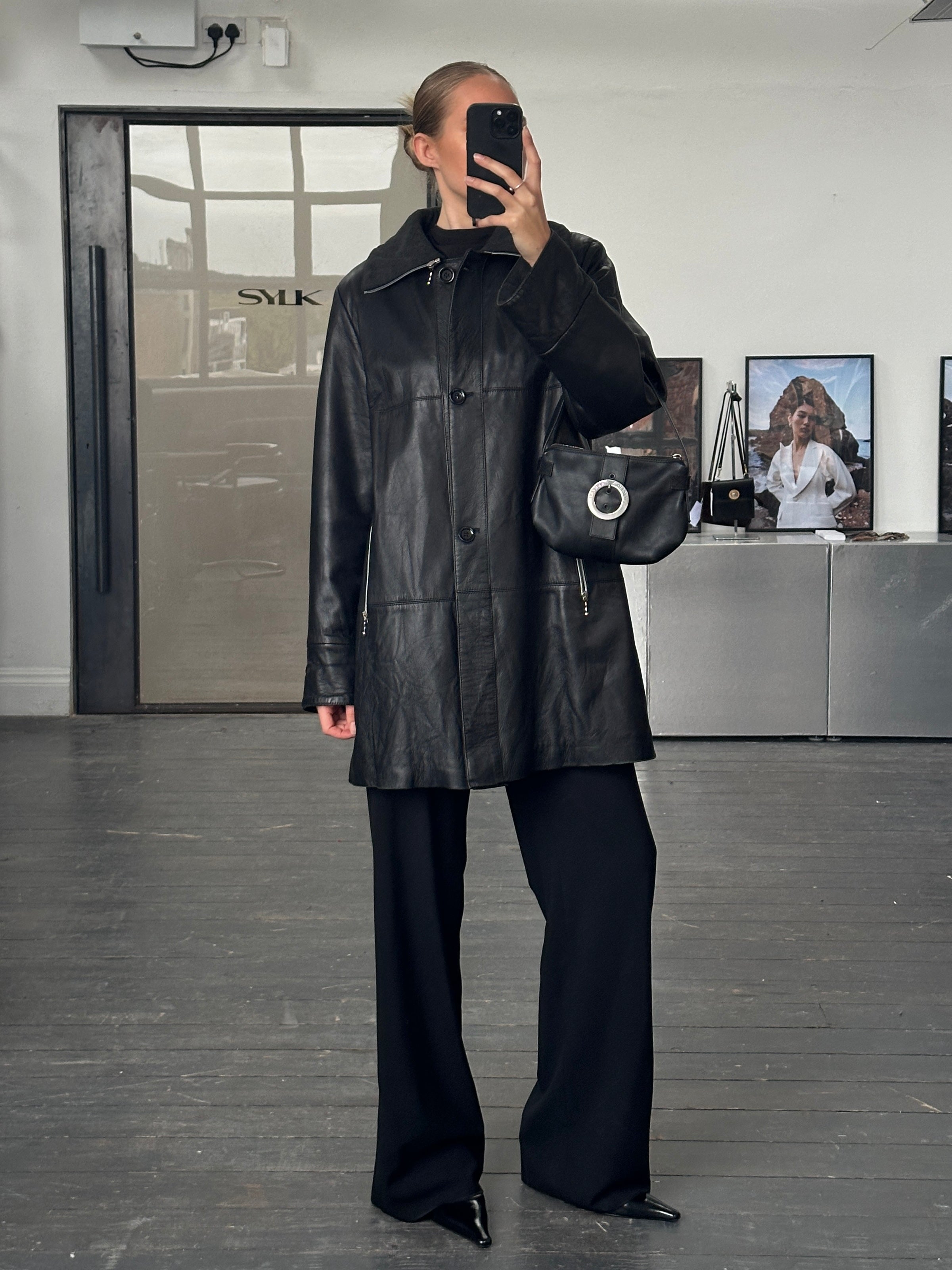 Conbipel 1990s smooth leather high neck coat in size L/XL, featuring a sleek design and high collar.