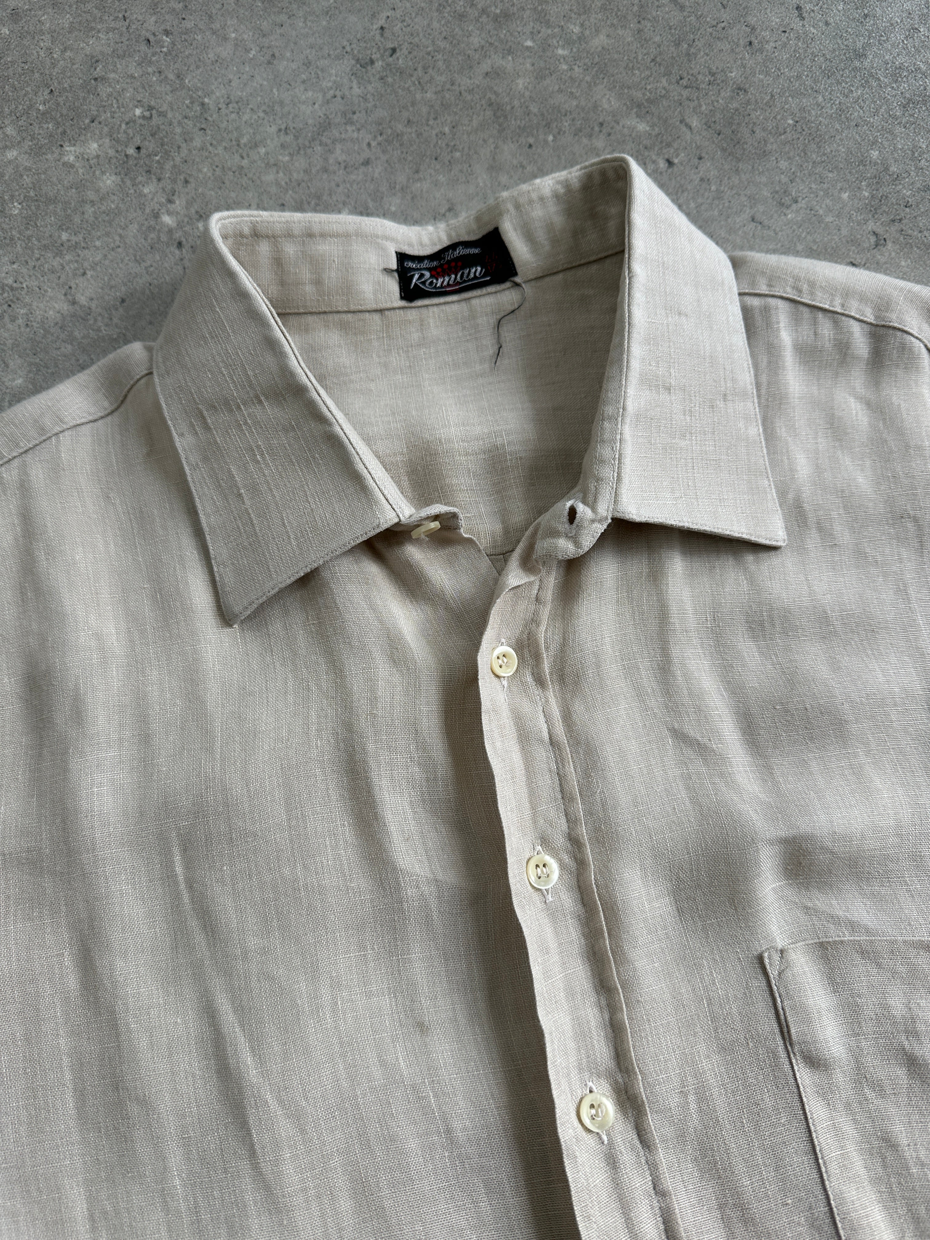 Vintage Italian 1990s pure linen short sleeve shirt in XL with a classic fit and natural linen texture.