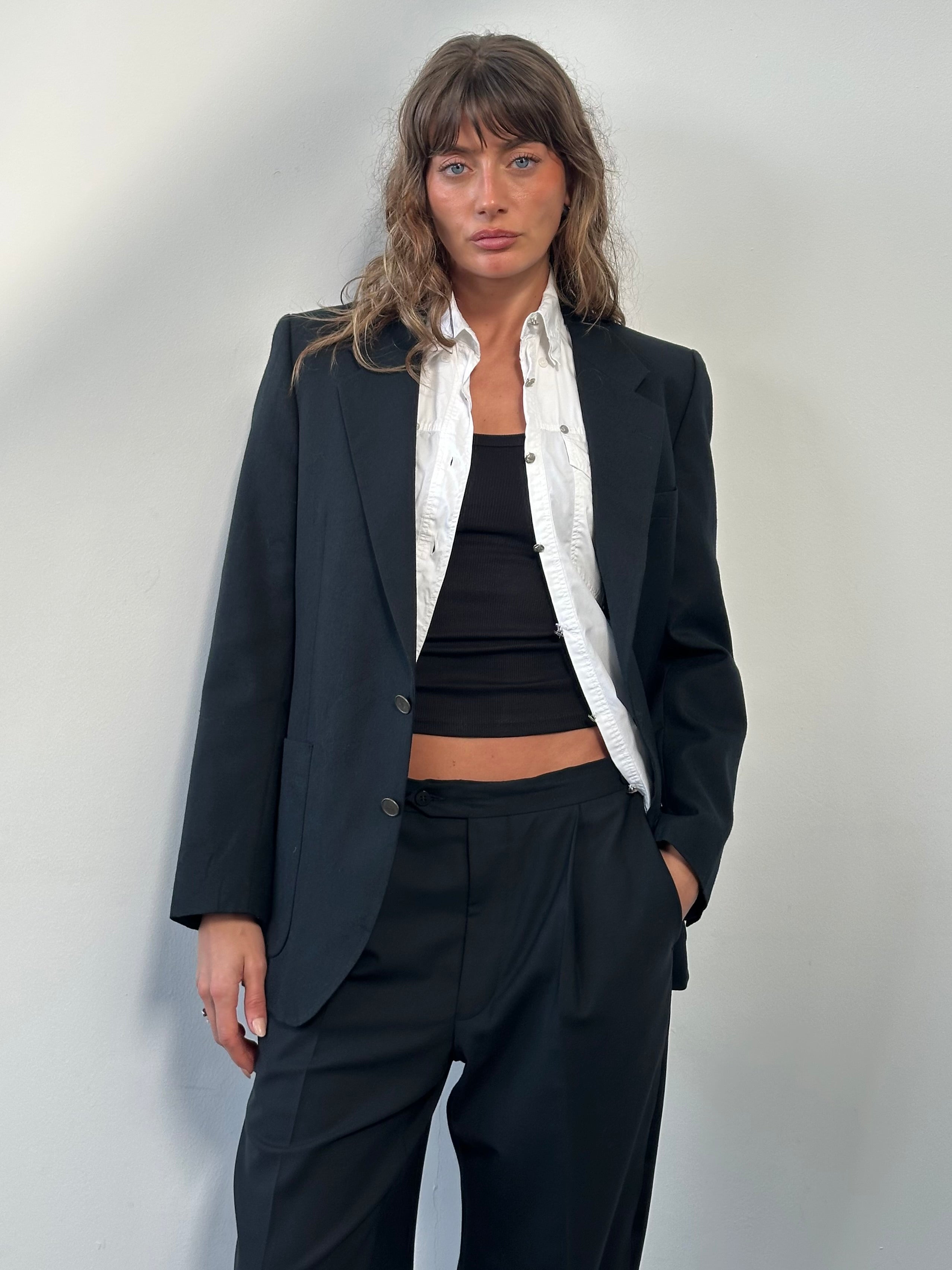 Yves Saint Laurent mens blazer from the 1990s, tailored pure wool bespoke button blazer in size 38R/M, navy blue color.