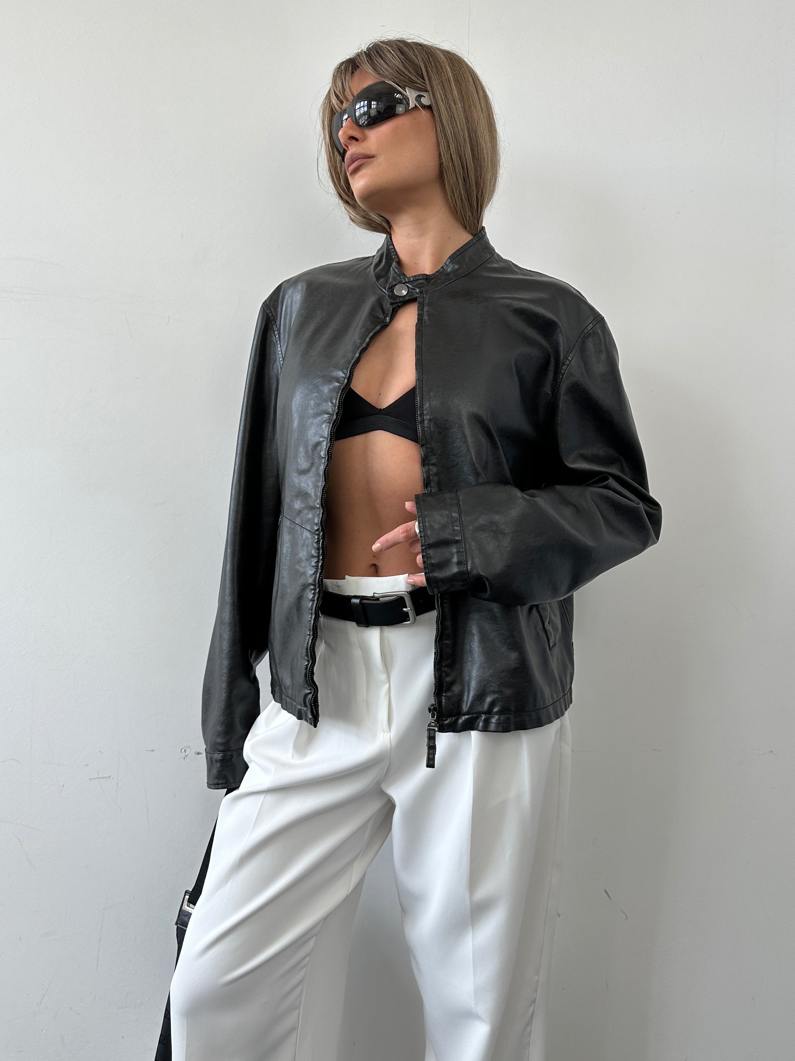 Armani Jeans faux leather biker jacket in size M with classic collar and zippered front, stylish and fitted for a modern look.