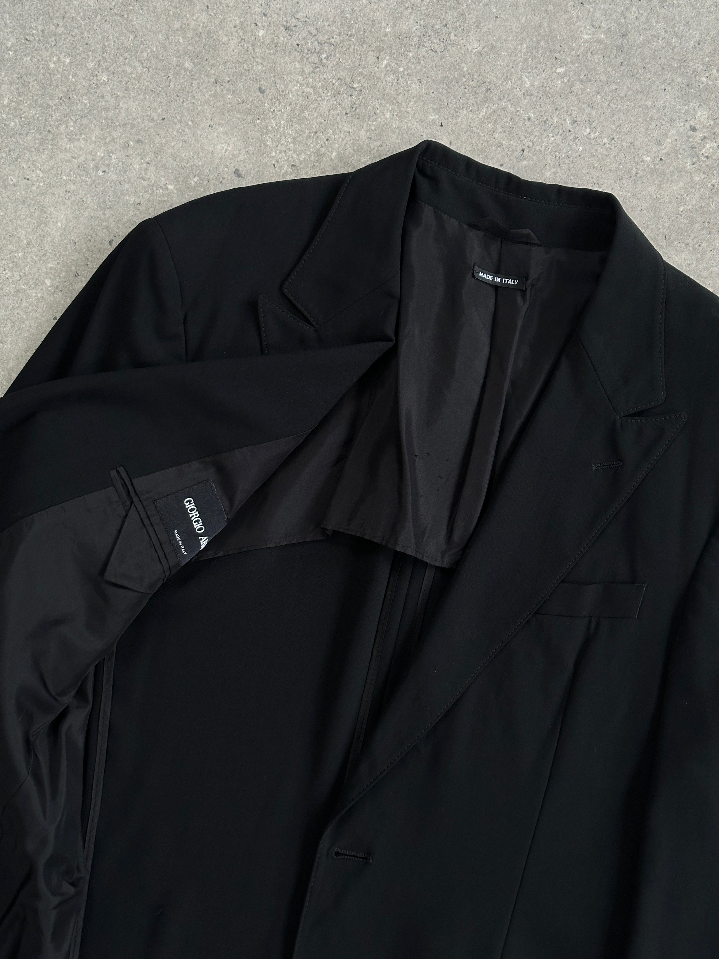 Giorgio Armani lightweight pure wool blazer in size M/L with single button, tailored fit, and classic style.