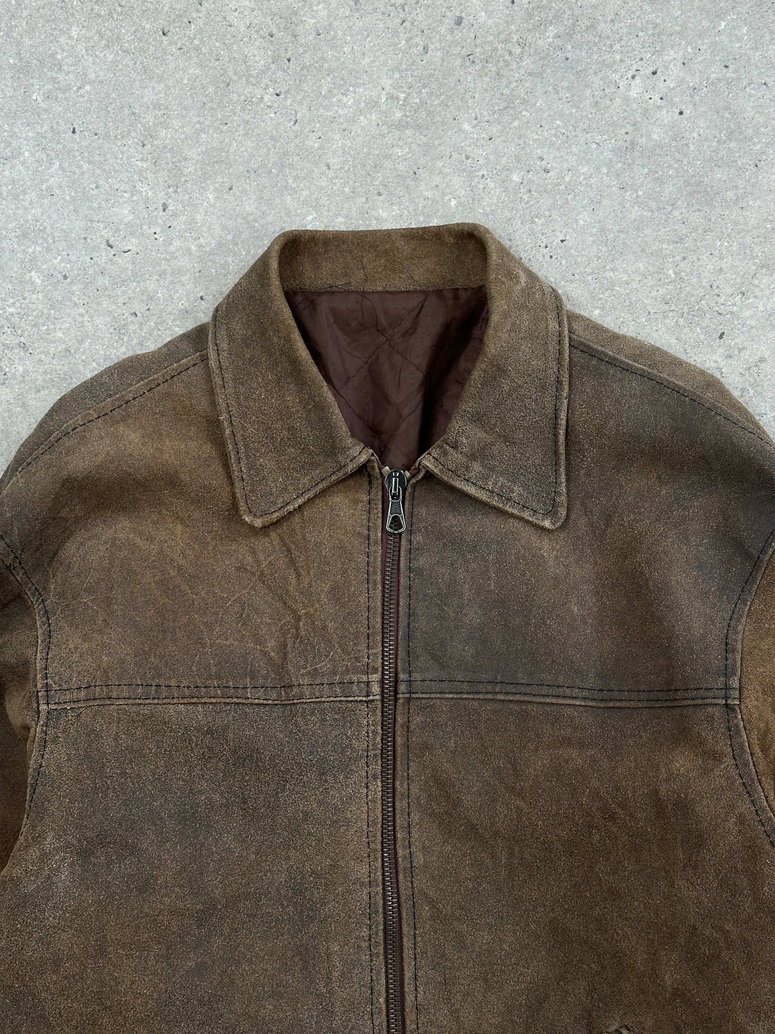 Vintage 1980s boxy leather jacket in size XL, featuring classic design and distressed leather details.