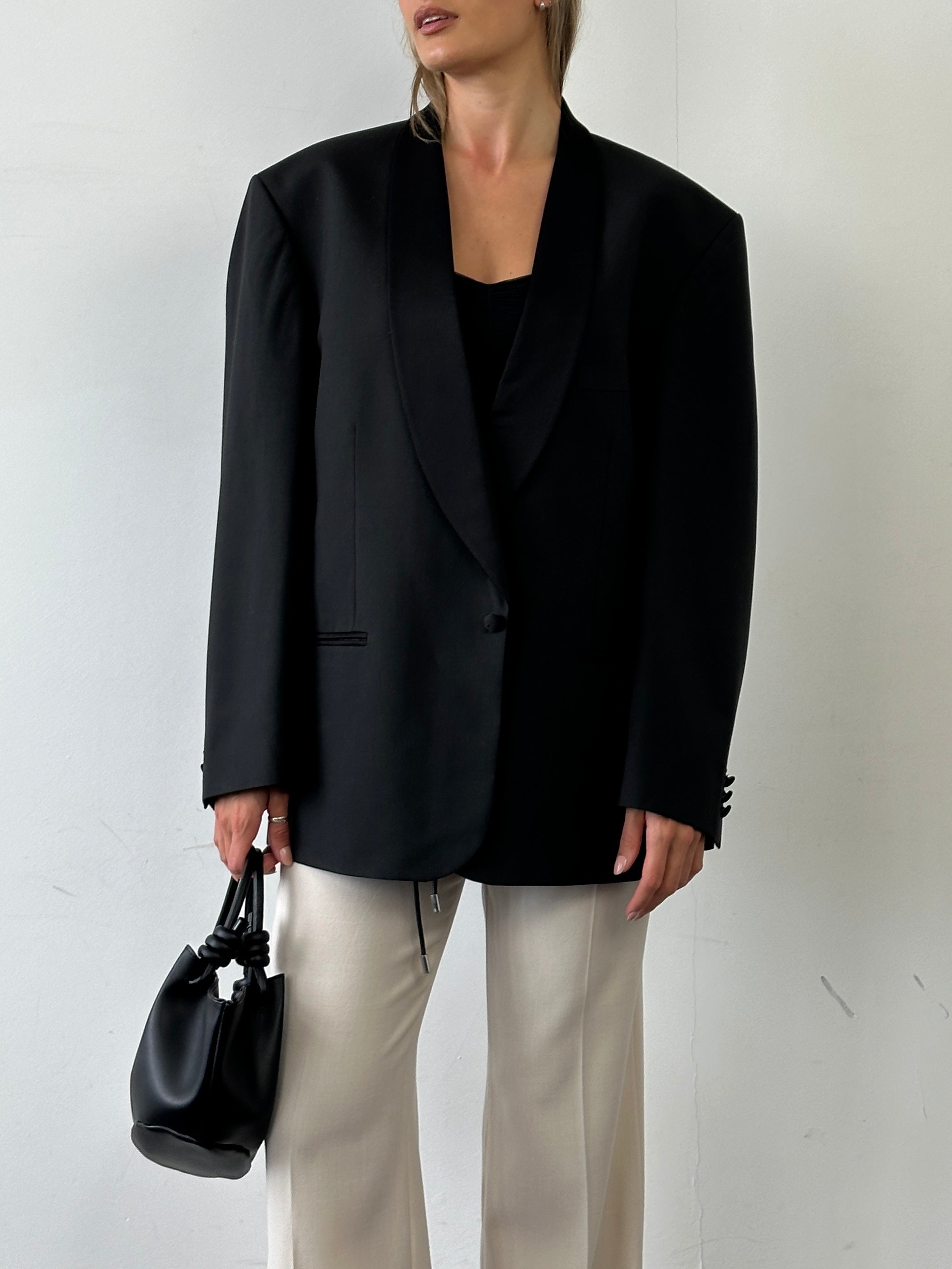 Pierre Cardin single-breasted tuxedo blazer in size 44R/XXL, tailored fit with classic lapels and sleek black fabric.