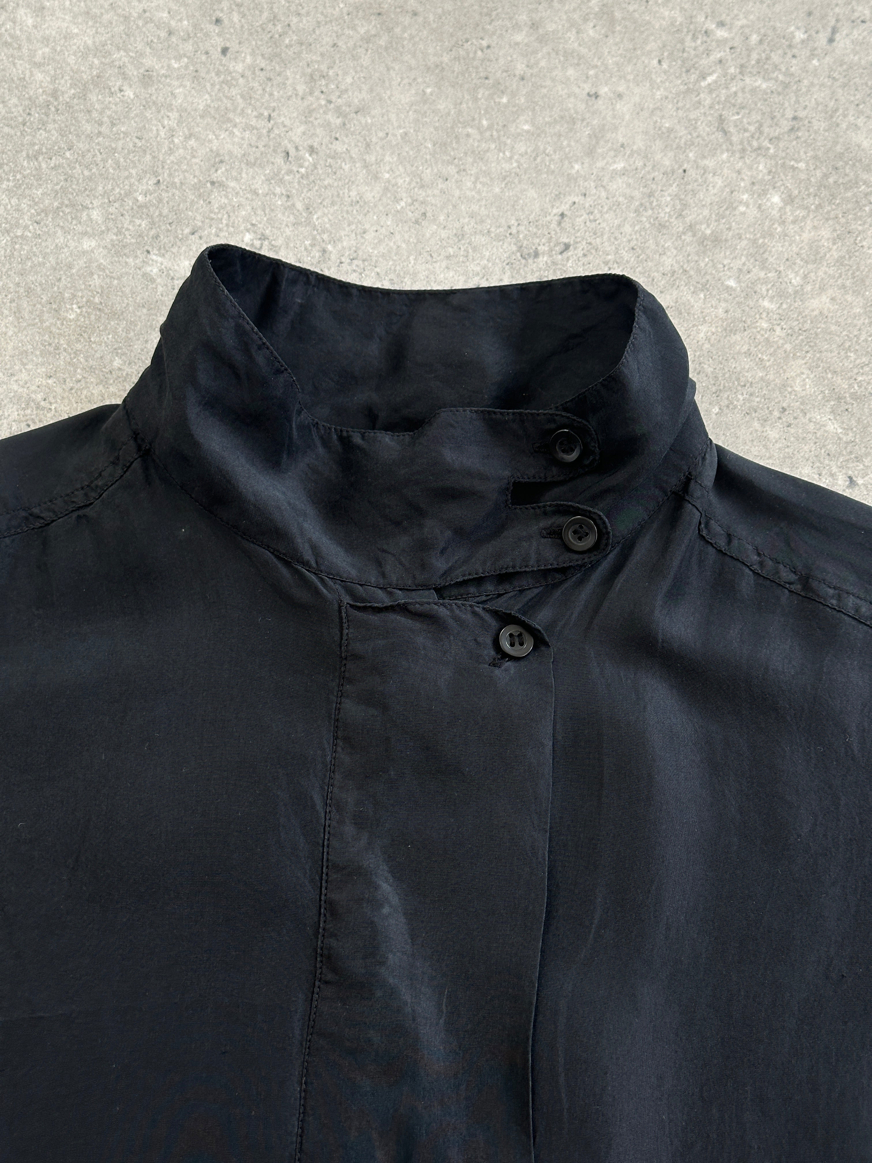 Vintage pure silk high neck shirt in size M, featuring a sleek design and smooth fabric, perfect for elegant casual wear.