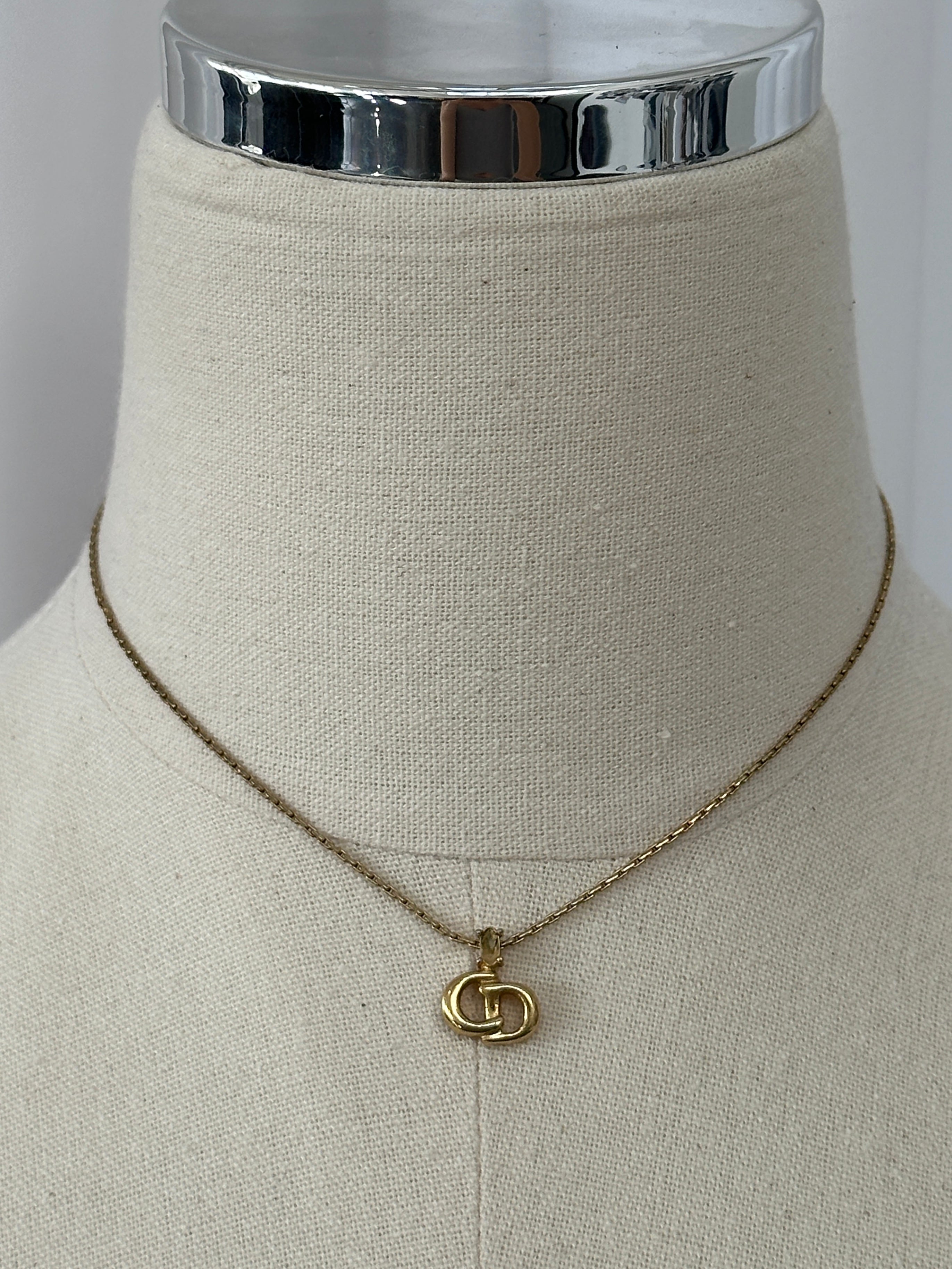 Christian Dior 1990s gold plated CD logo pendant necklace, 16-inch chain with iconic designer jewelry detail