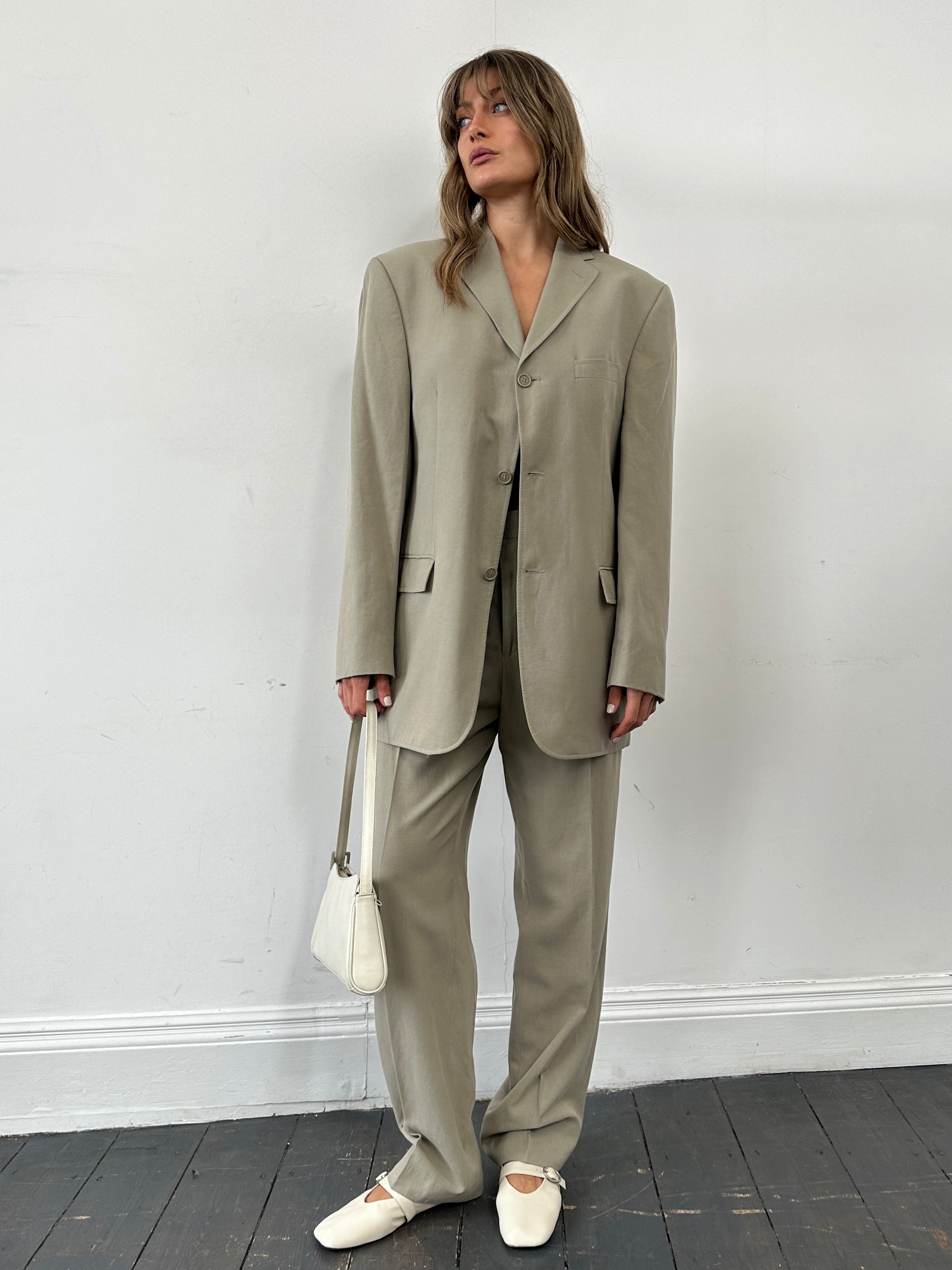 Pierre Cardin lyocell jumpsuit, single-breasted design, in size 42R/W34, displayed on a neutral background.