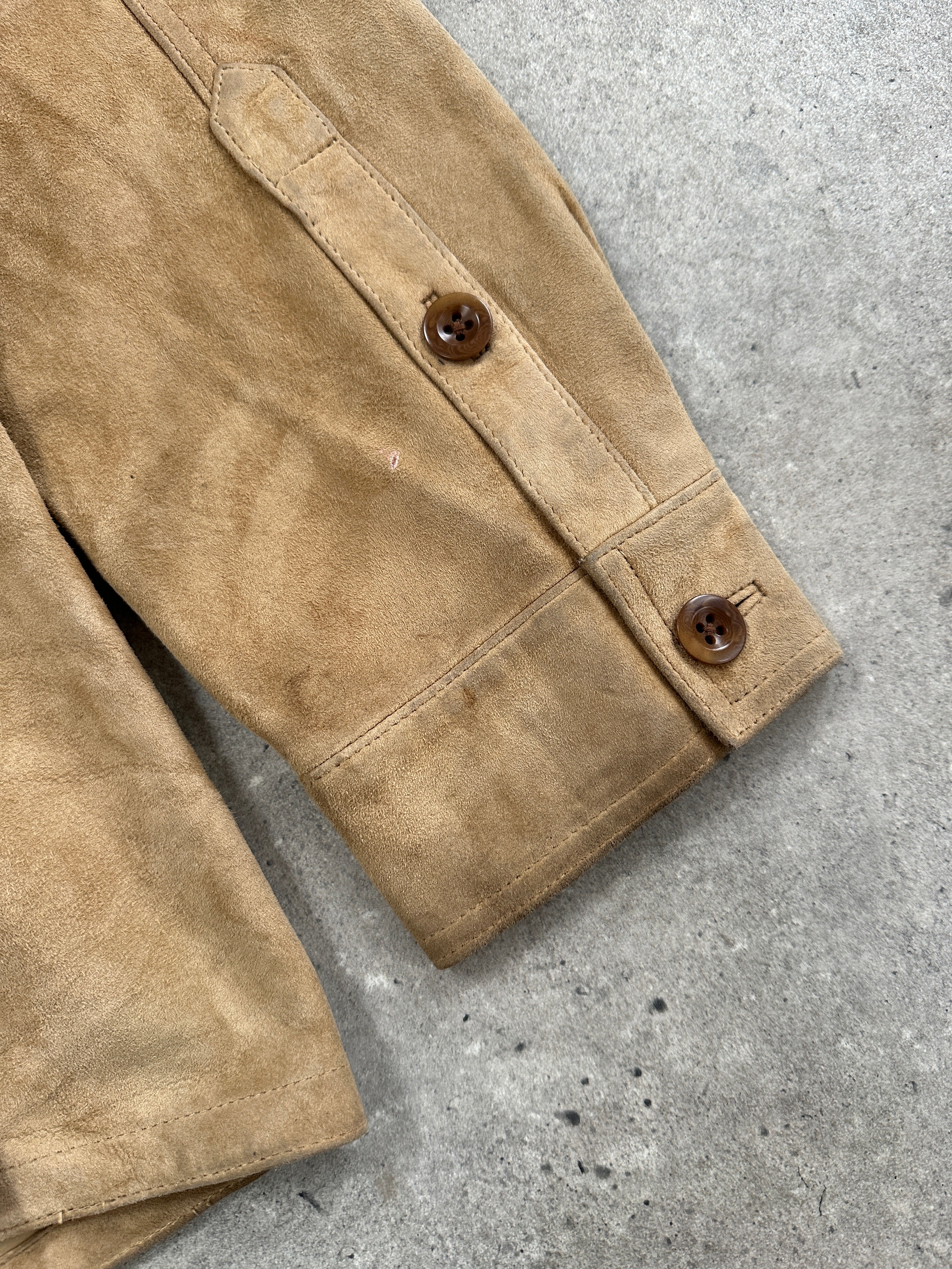Ralph Lauren Polo 2000s safari-style suede jacket in XL, featuring a tan color, collar, and button details.