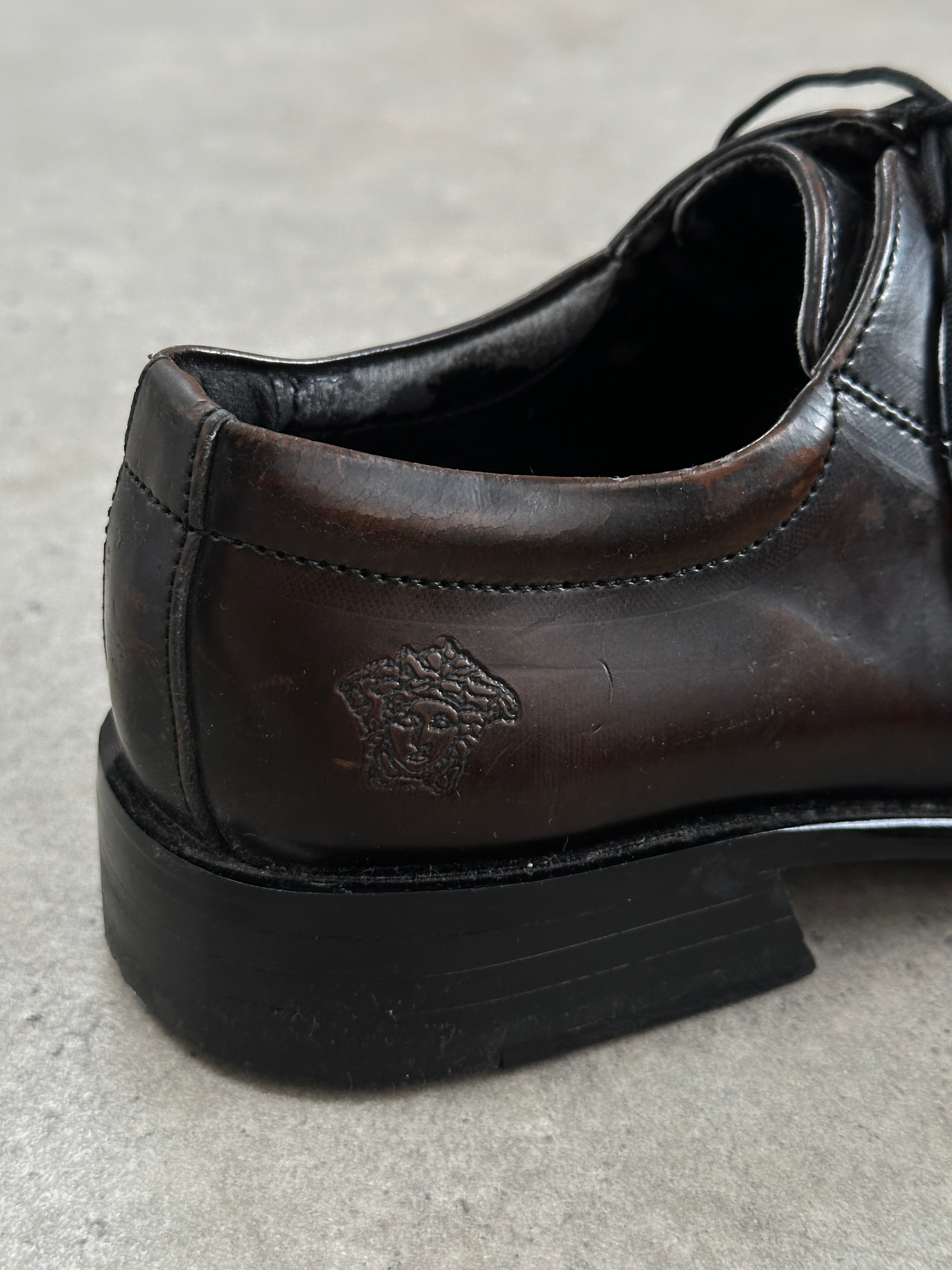 Versace Classic V2 leather square toe loafers in UK size 7, showcasing black leather shoes with sleek design and Versace branding.