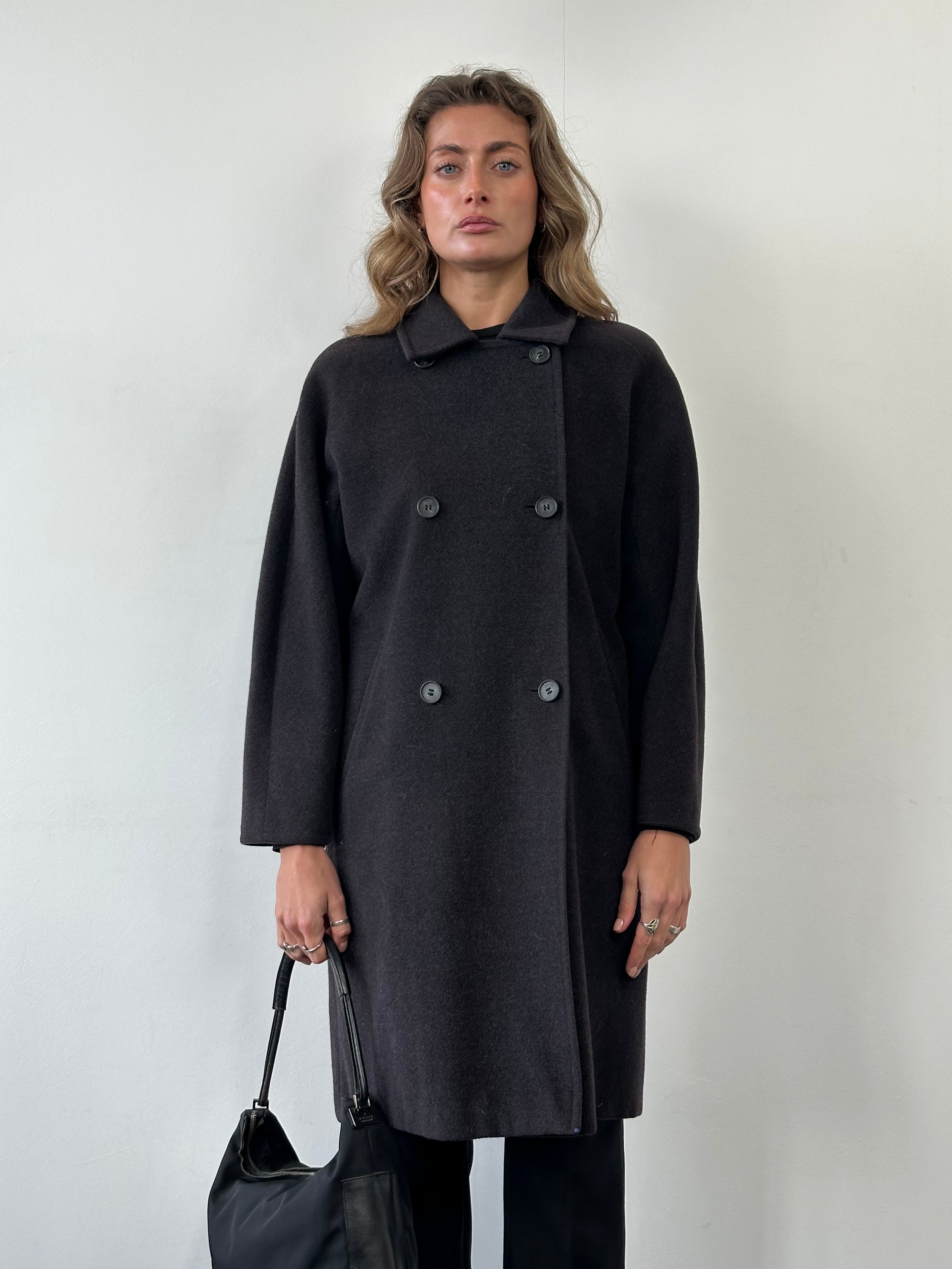 Max Mara pure wool double-breasted coat in size M, shown on a hanger with classic notch lapels and tailored fit.