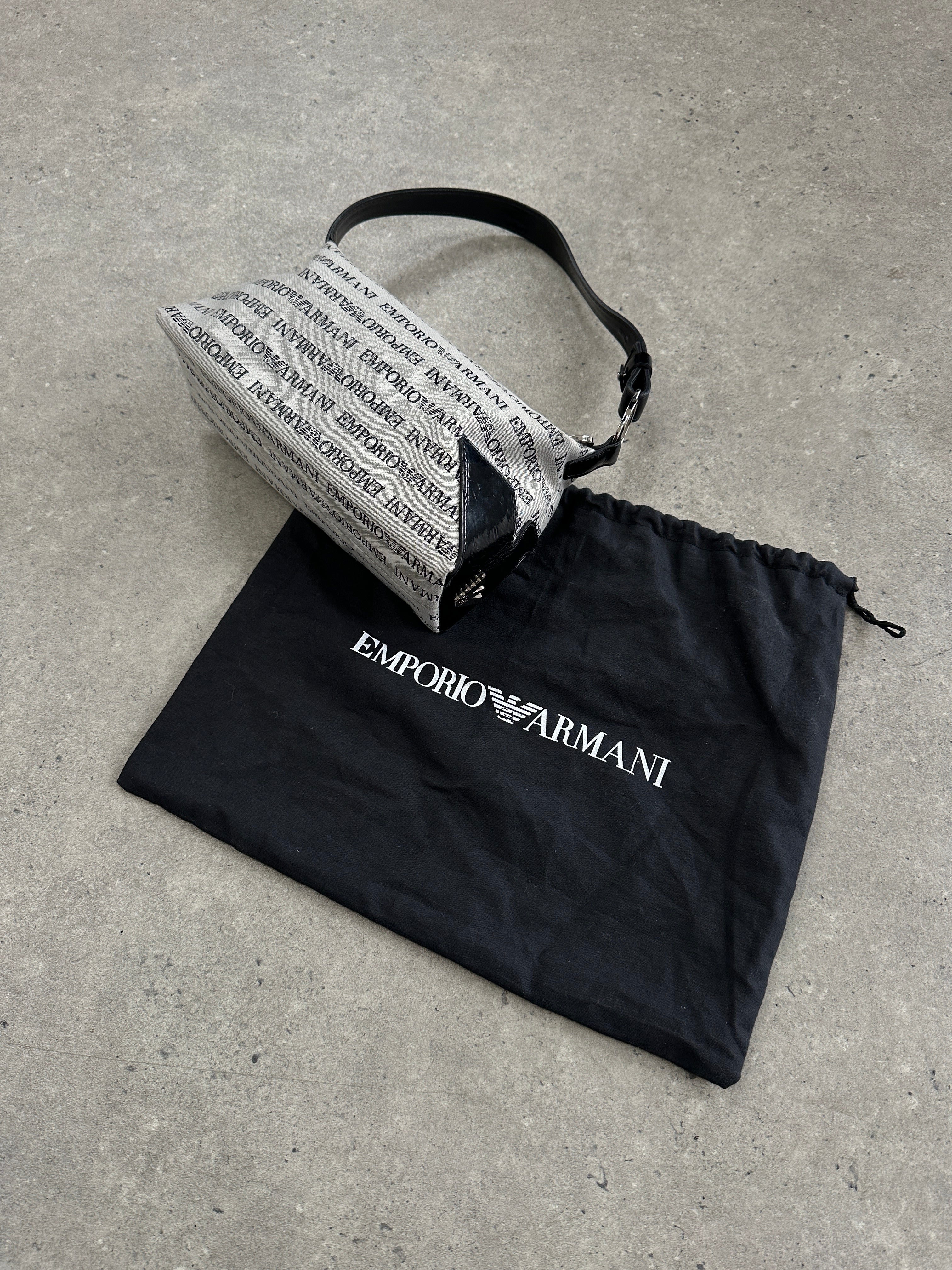 Emporio Armani Monogram Shoulder Bag with leather strap and signature Armani logo, stylish accessory for everyday use.