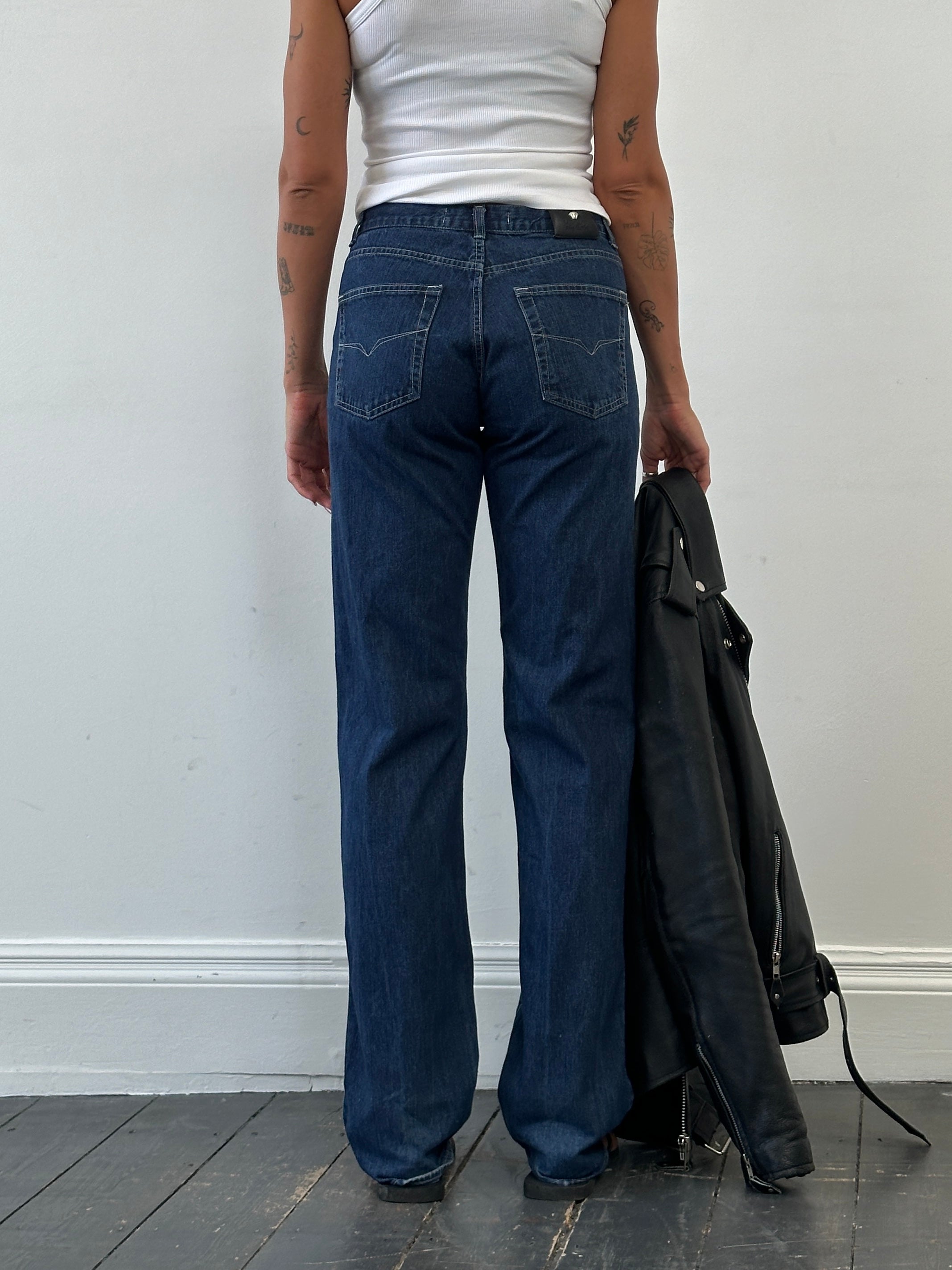 Versace Jeans Couture mid-wasted denim jeans in size W27, showcasing classic blue denim and stylish fit
