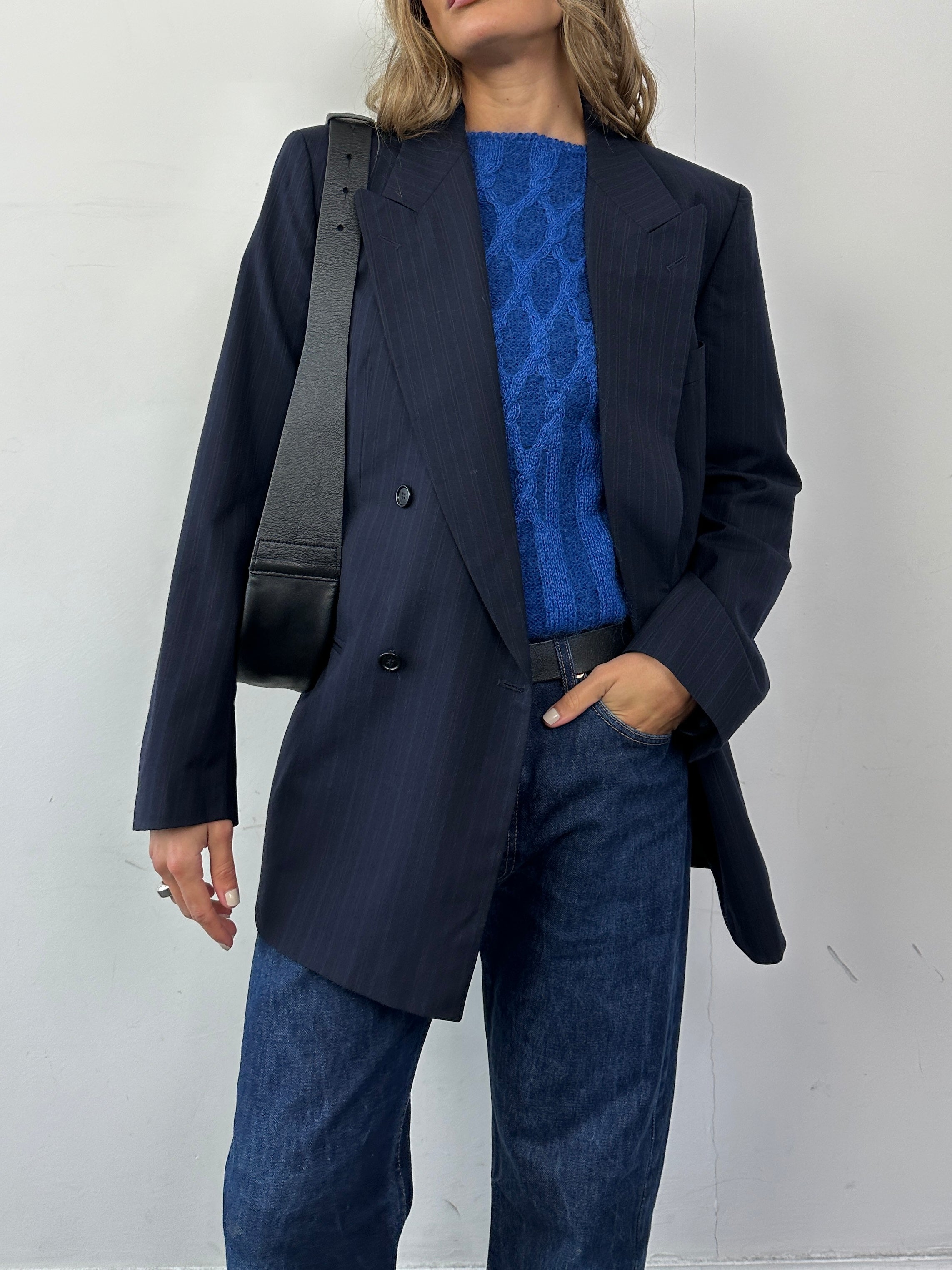 Hugo Boss pinstripe pure wool double-breasted blazer in size L, tailored fit with classic lapels and structured design.