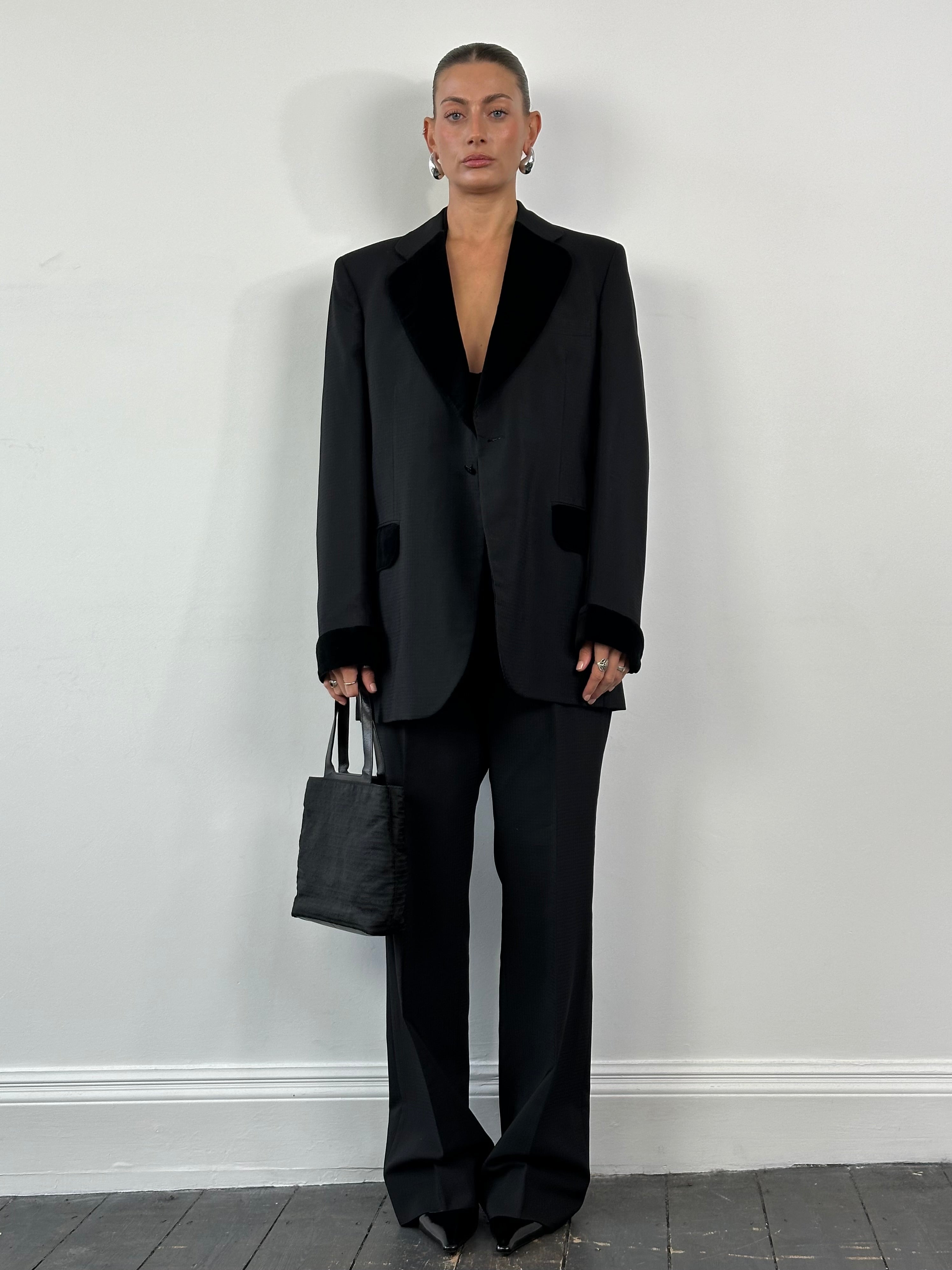 Christian Dior Monsieur 1990s velvet three-piece tuxedo suit, size 44L/W30, displayed on a hanger.