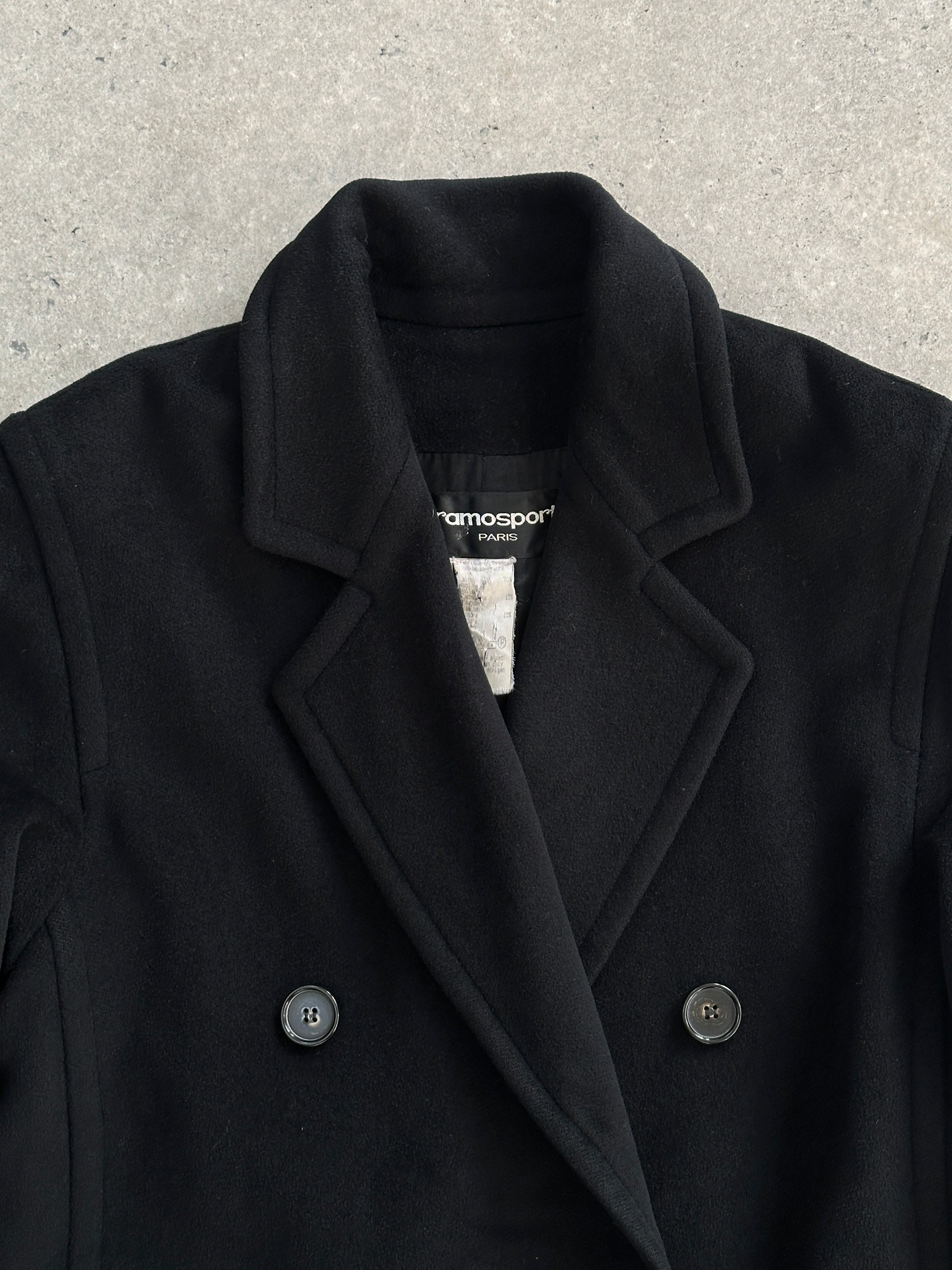 Vintage wool and cashmere double-breasted coat in size M/L, featuring classic design and tailored fit, shown on a hanger.