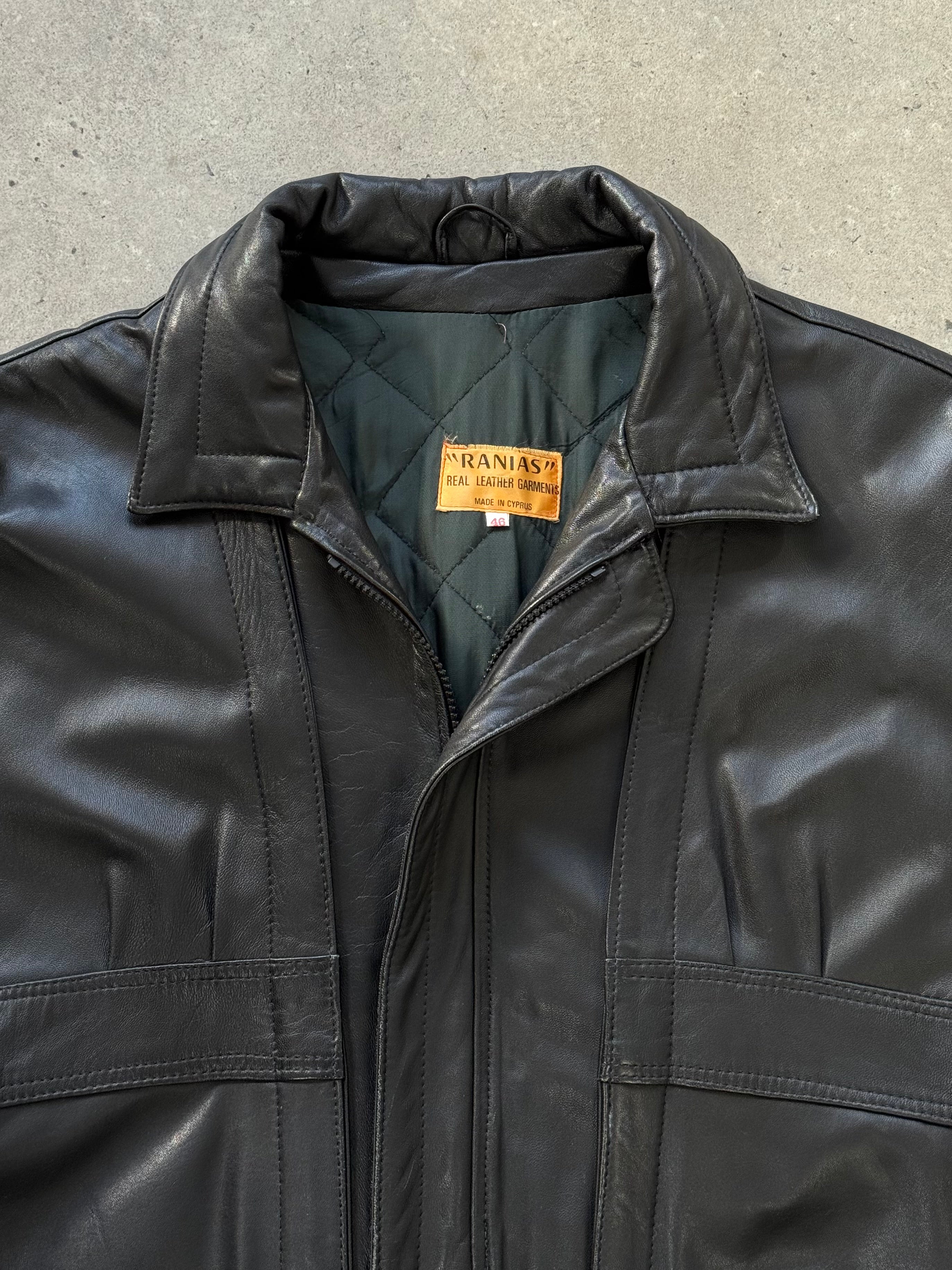 Vintage 1990s leather bomber jacket in XL, showcasing classic design and aged leather texture.