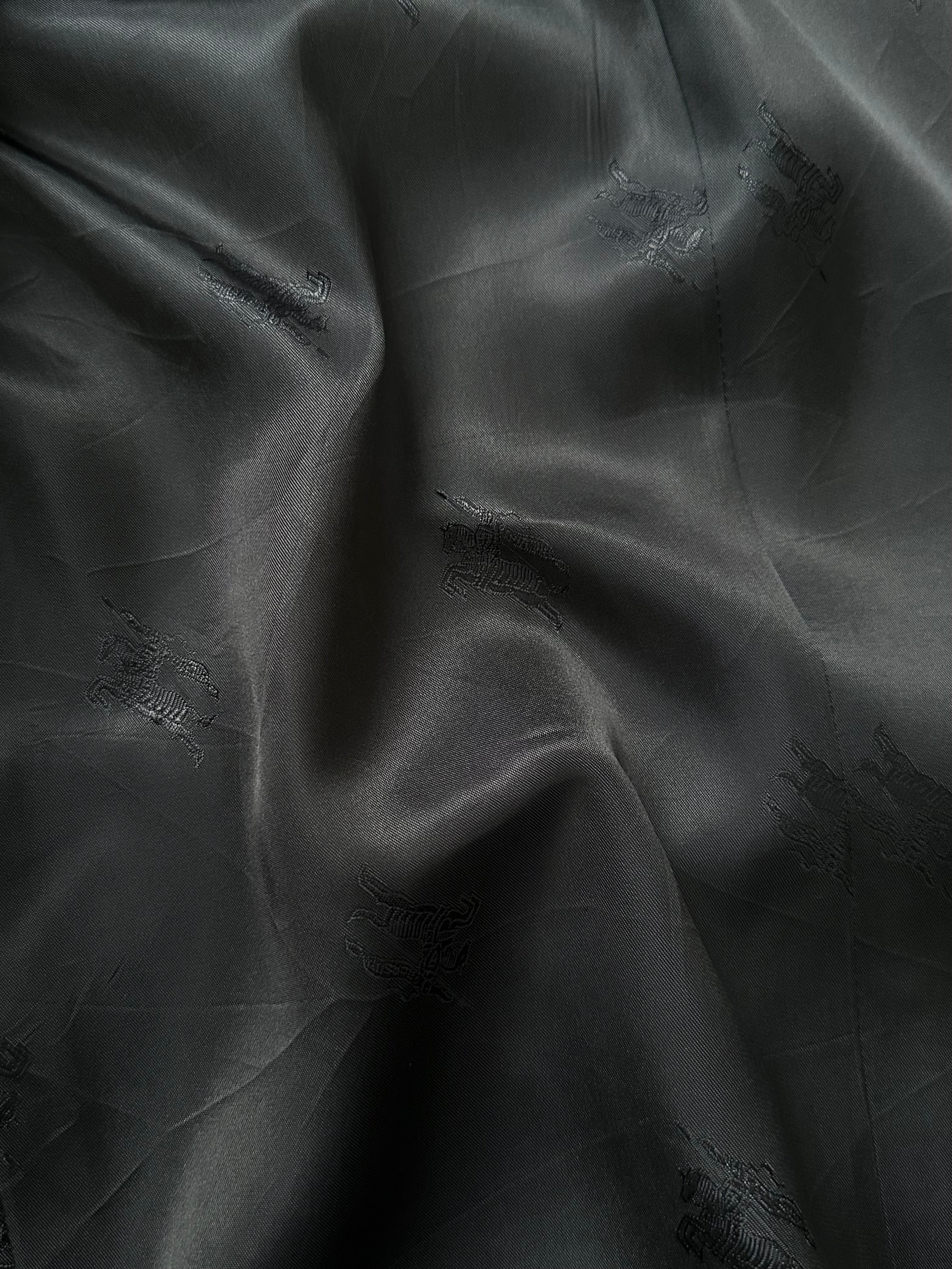 Burberry 1990s double-breasted wool blazer in size 42R/XL, tailored fit with classic button detailing and traditional Burberry style.