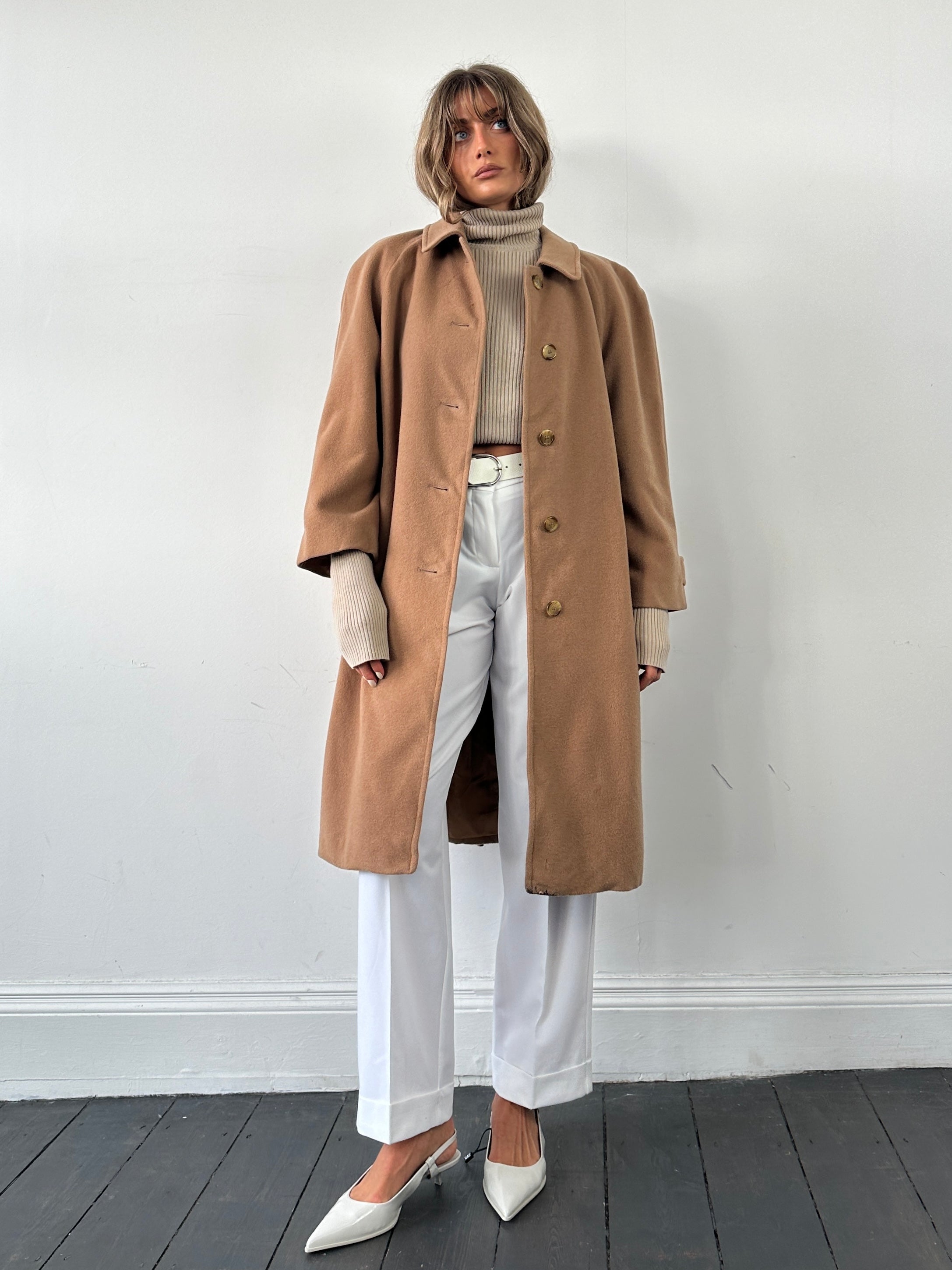 Burberry wool camel hair single-breasted coat in size large, showcasing classic design and tailored fit.
