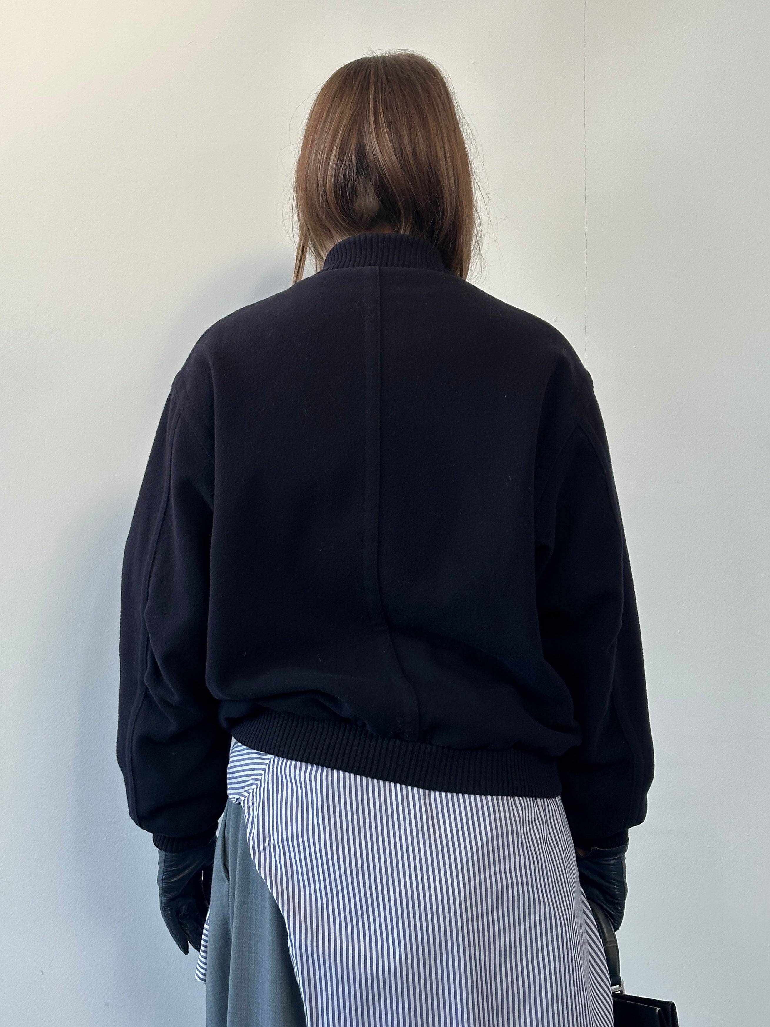 St Michael 1980s pure wool bomber jacket in size L, navy blue with ribbed cuffs and waistband, front zip closure, and classic style.