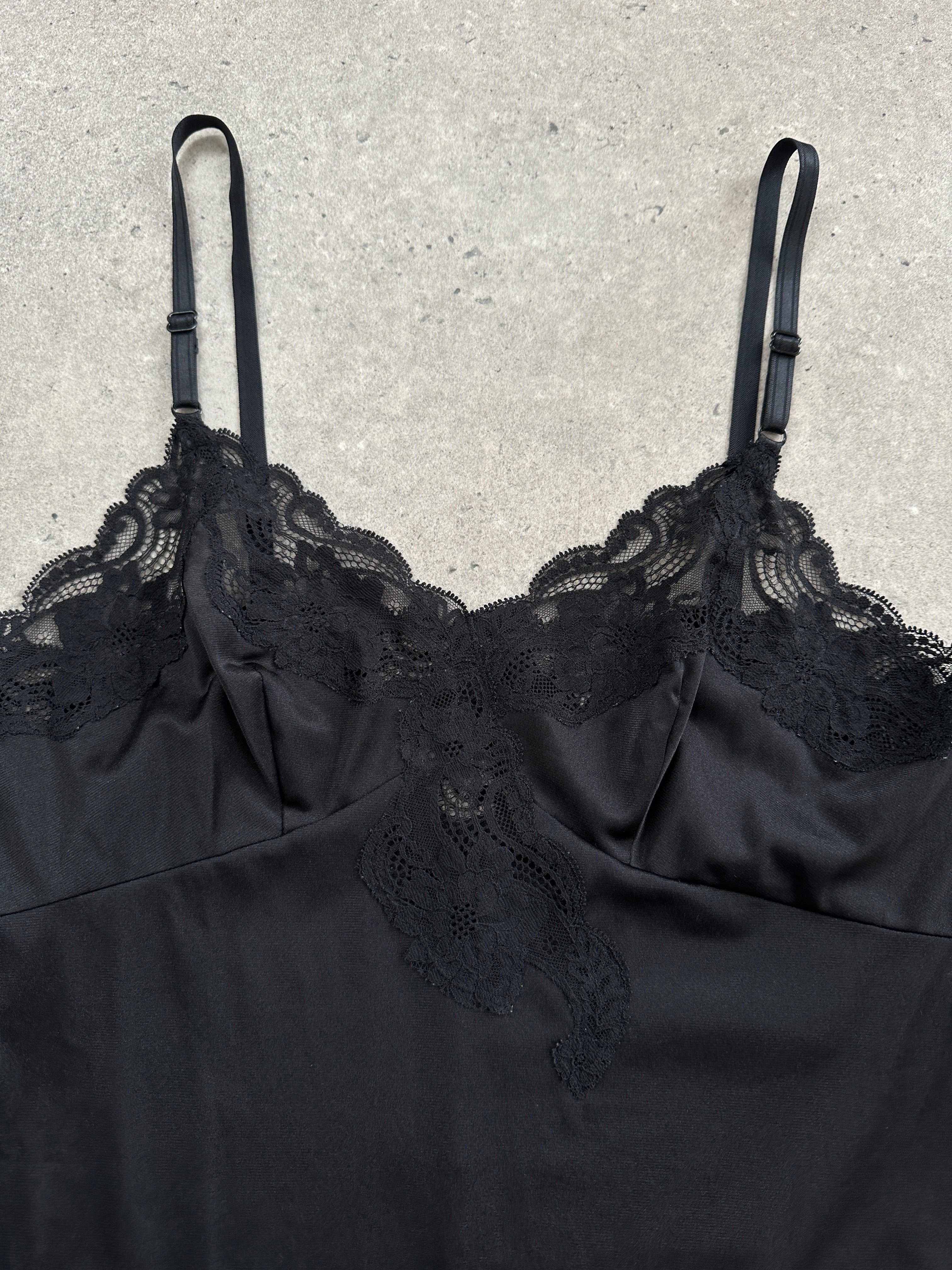Vintage 2000s lace side split mini slip dress in size S, featuring delicate lace fabric and a stylish side slit.